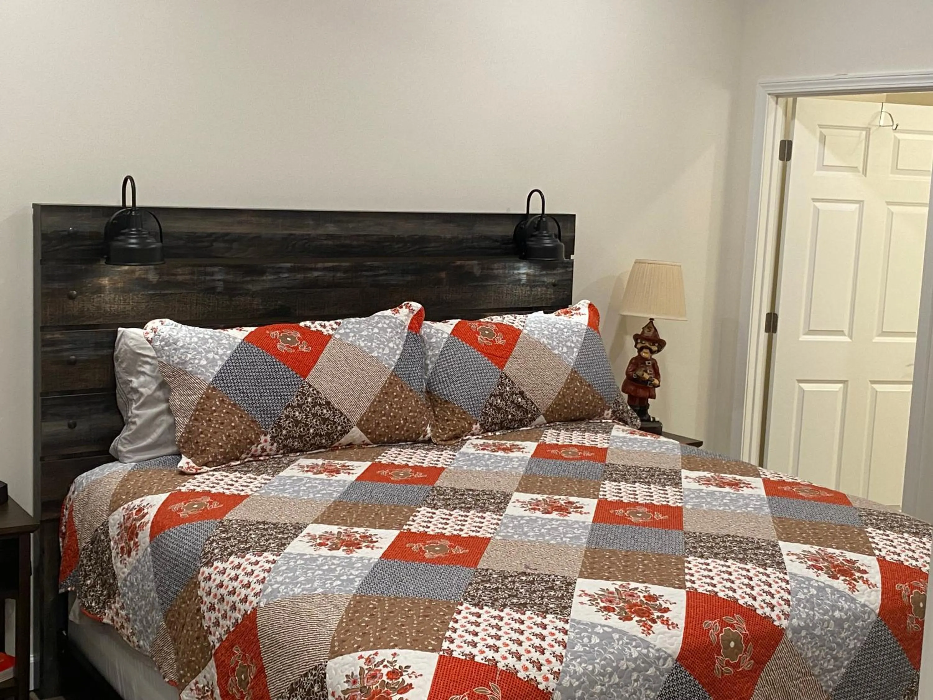 Bed in Hermann Crown Suites