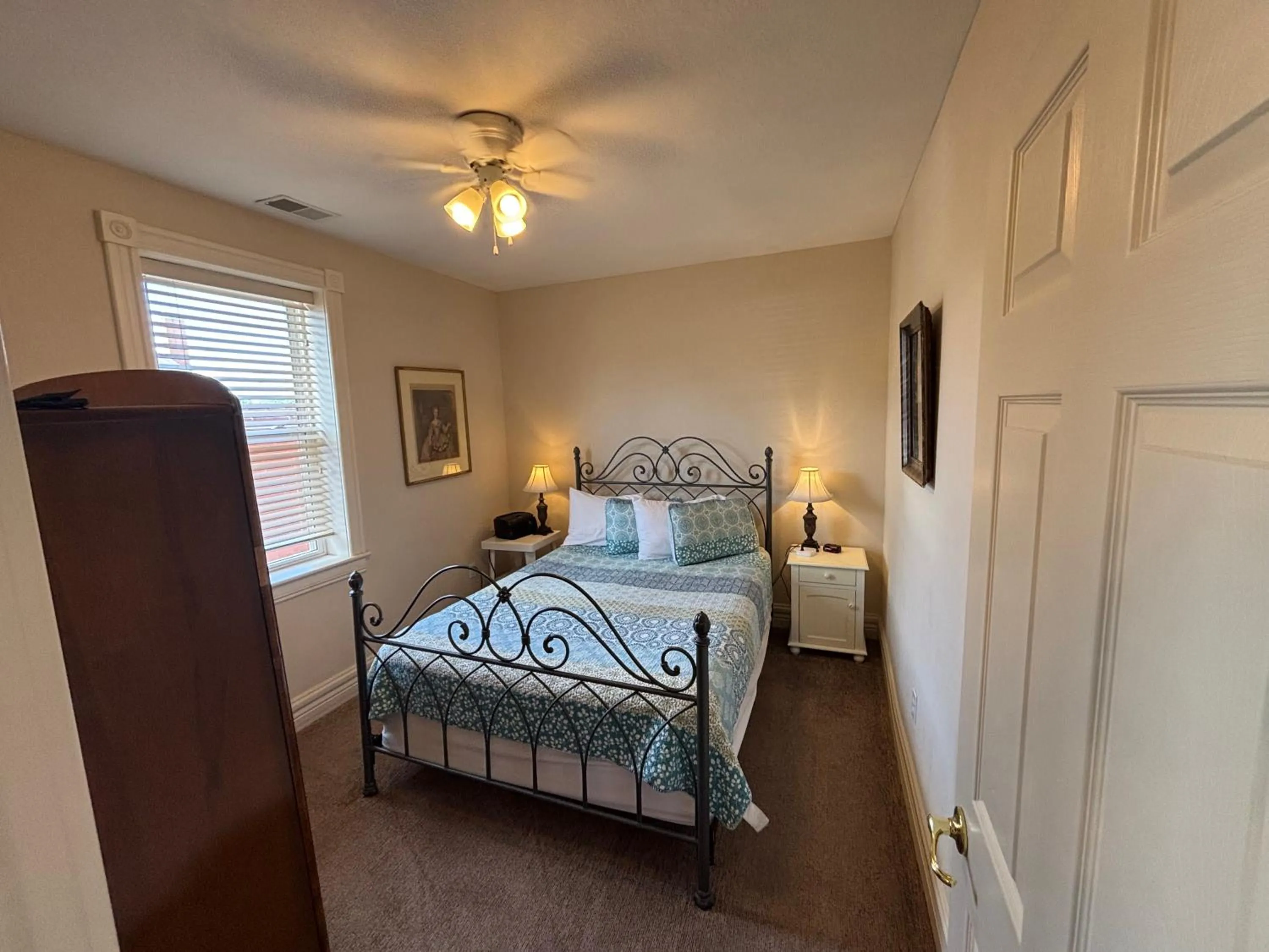 Bed in Hermann Crown Suites