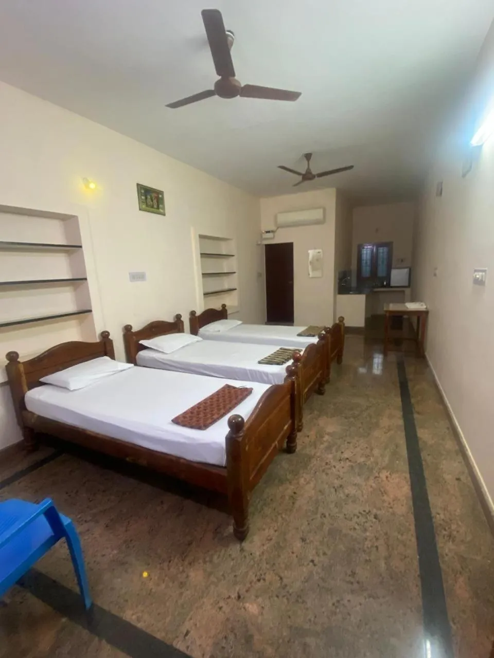 Bed in Vijaya Guest House