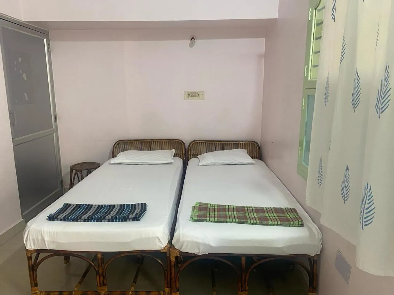 Bed in Vijaya Guest House