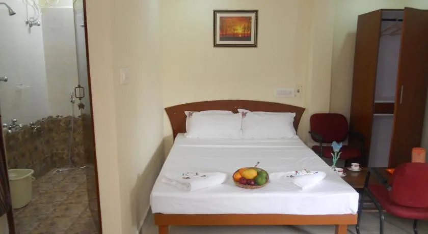 cot, Bed in Vijaya Guest House