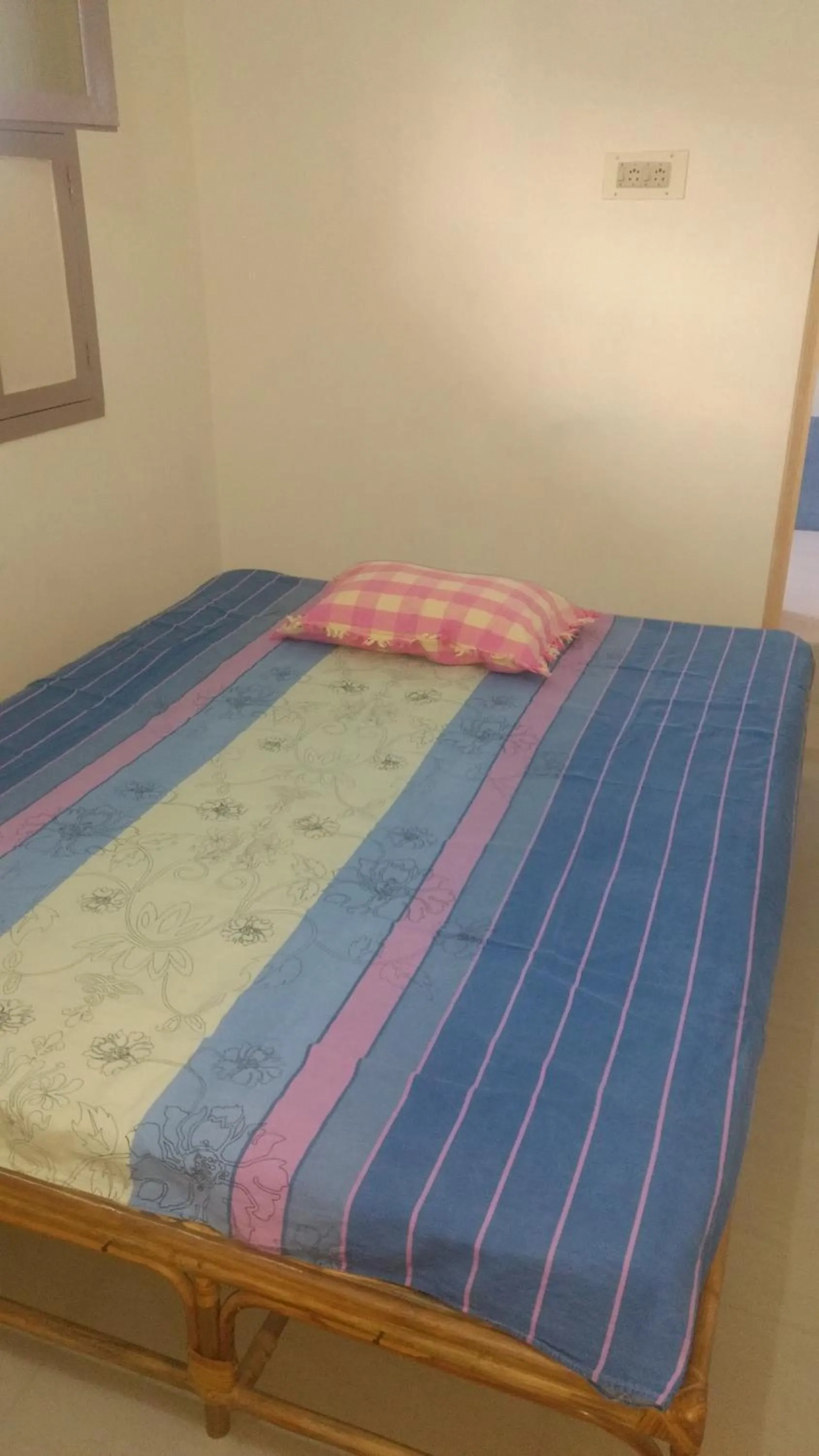 Bed in Vijaya Guest House