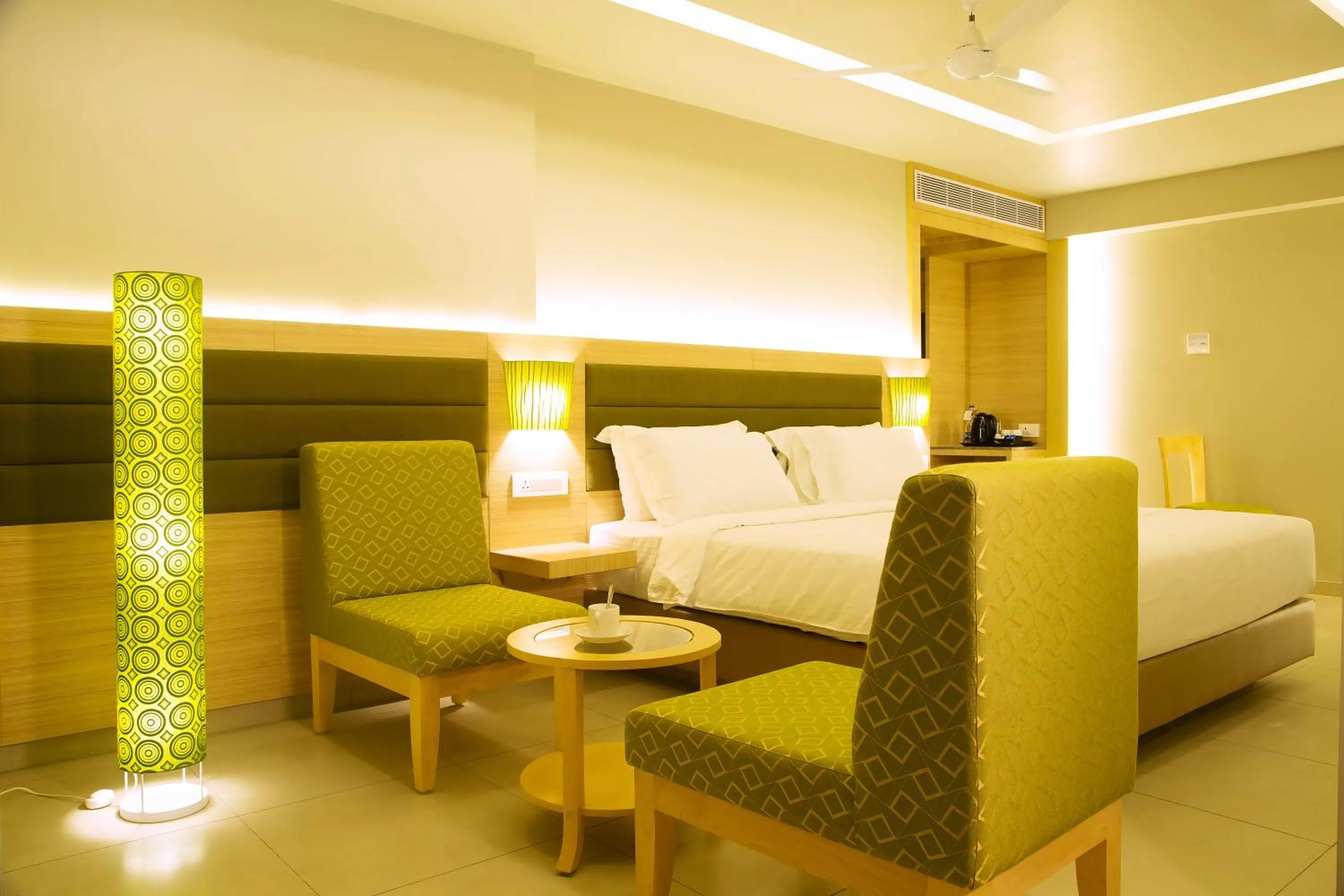 Photo of the whole room, Bed in KVM Hotels Srirangam