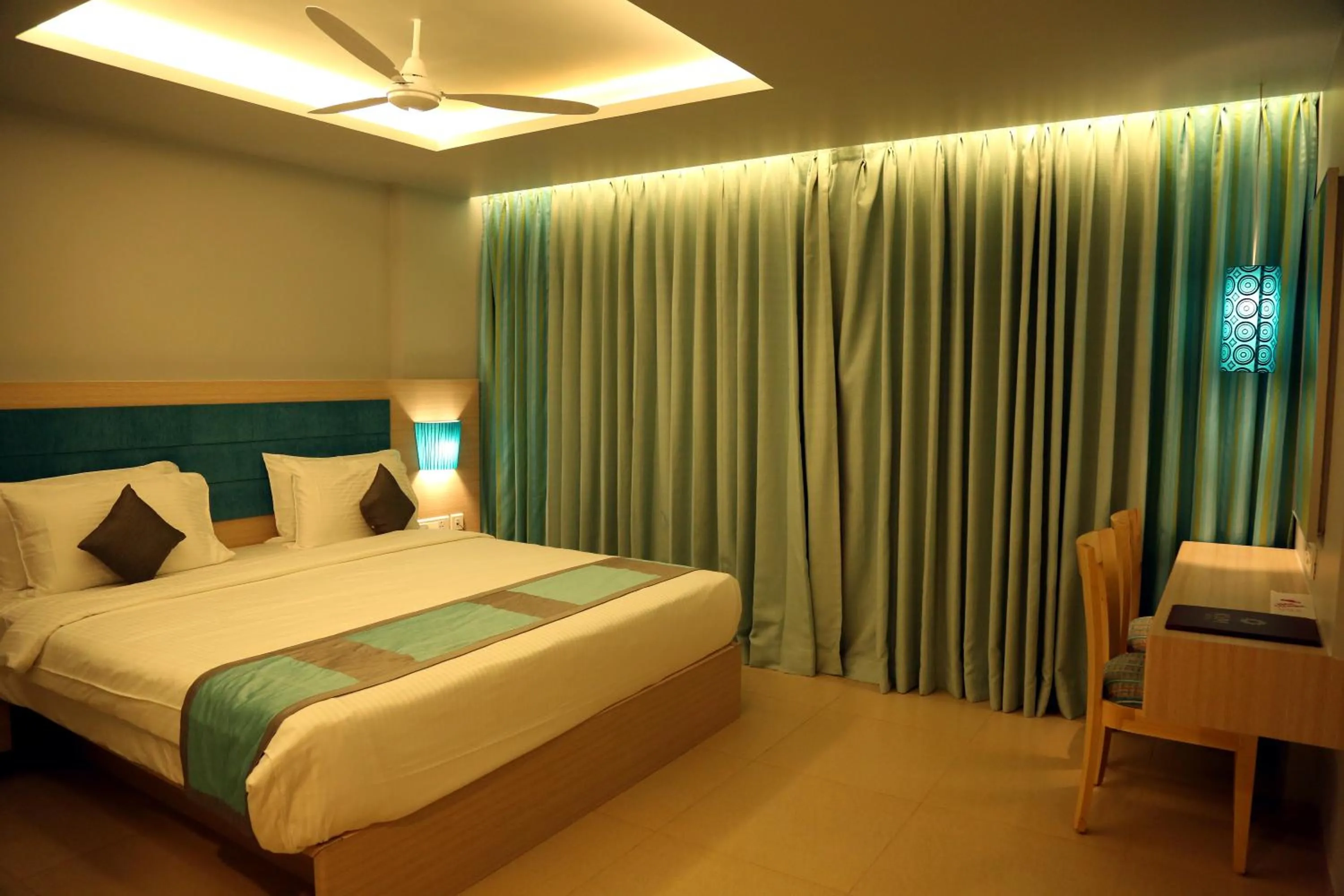 Bed in KVM Hotels Srirangam