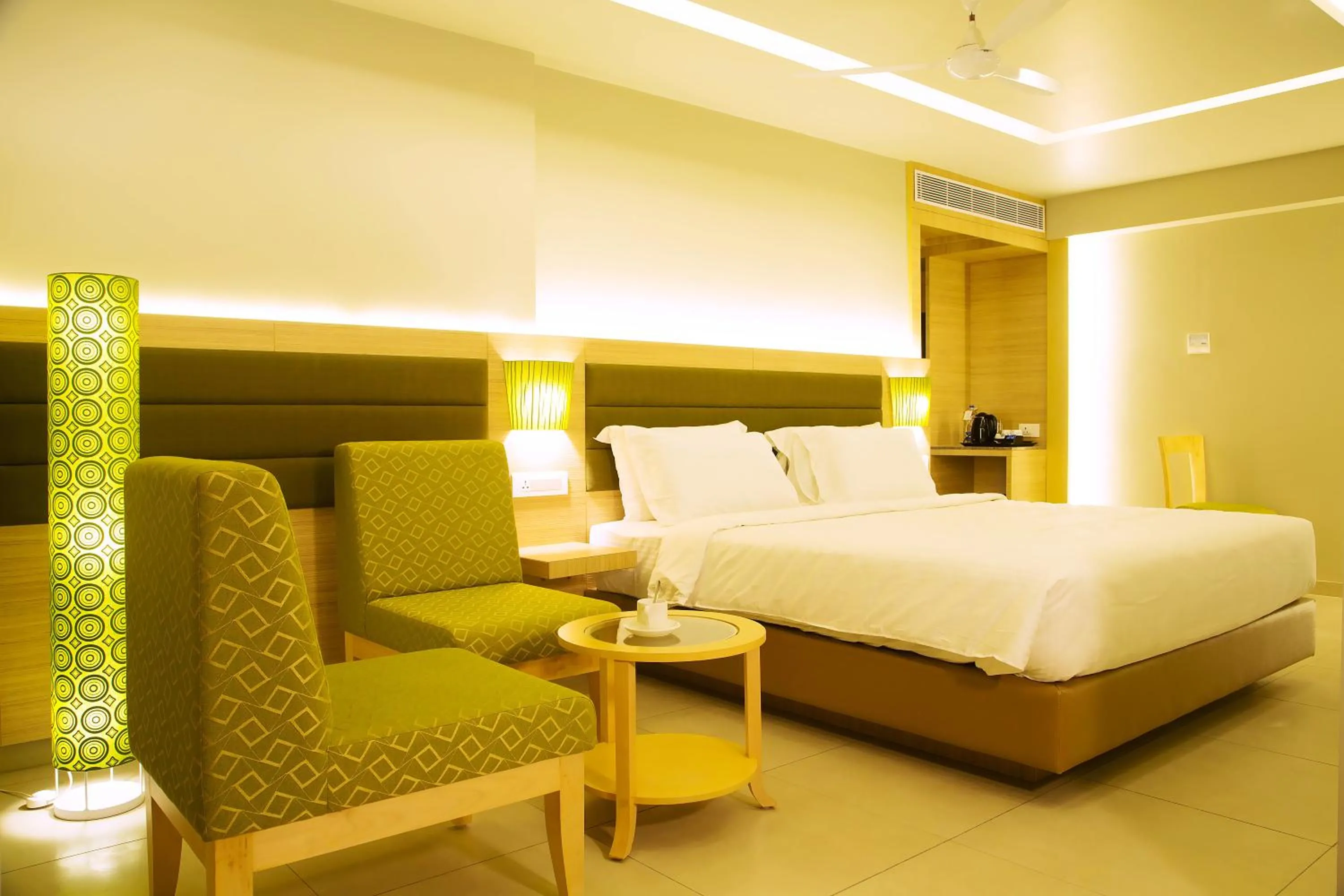 Photo of the whole room, Bed in KVM Hotels Srirangam