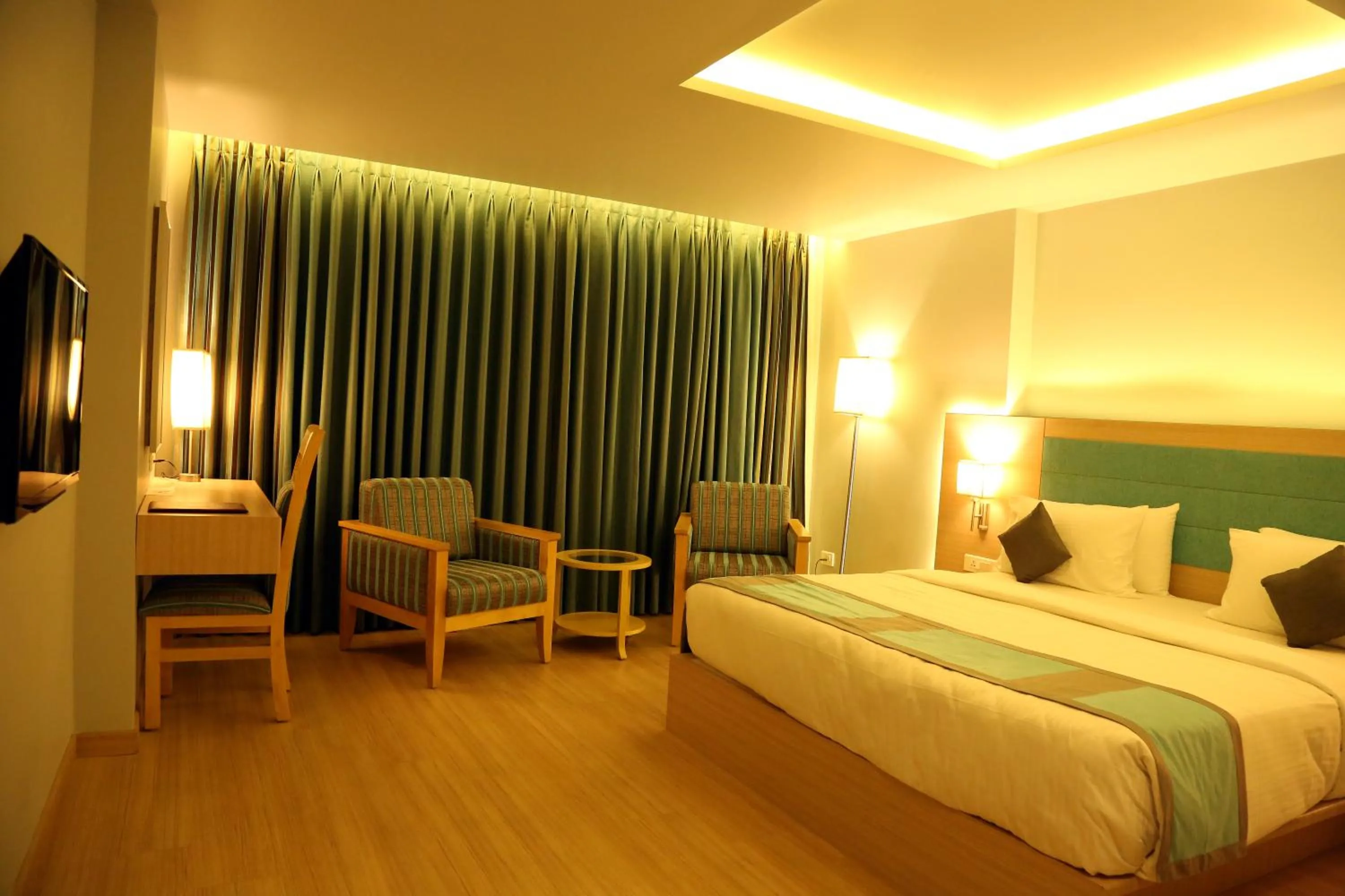 Photo of the whole room, Bed in KVM Hotels Srirangam