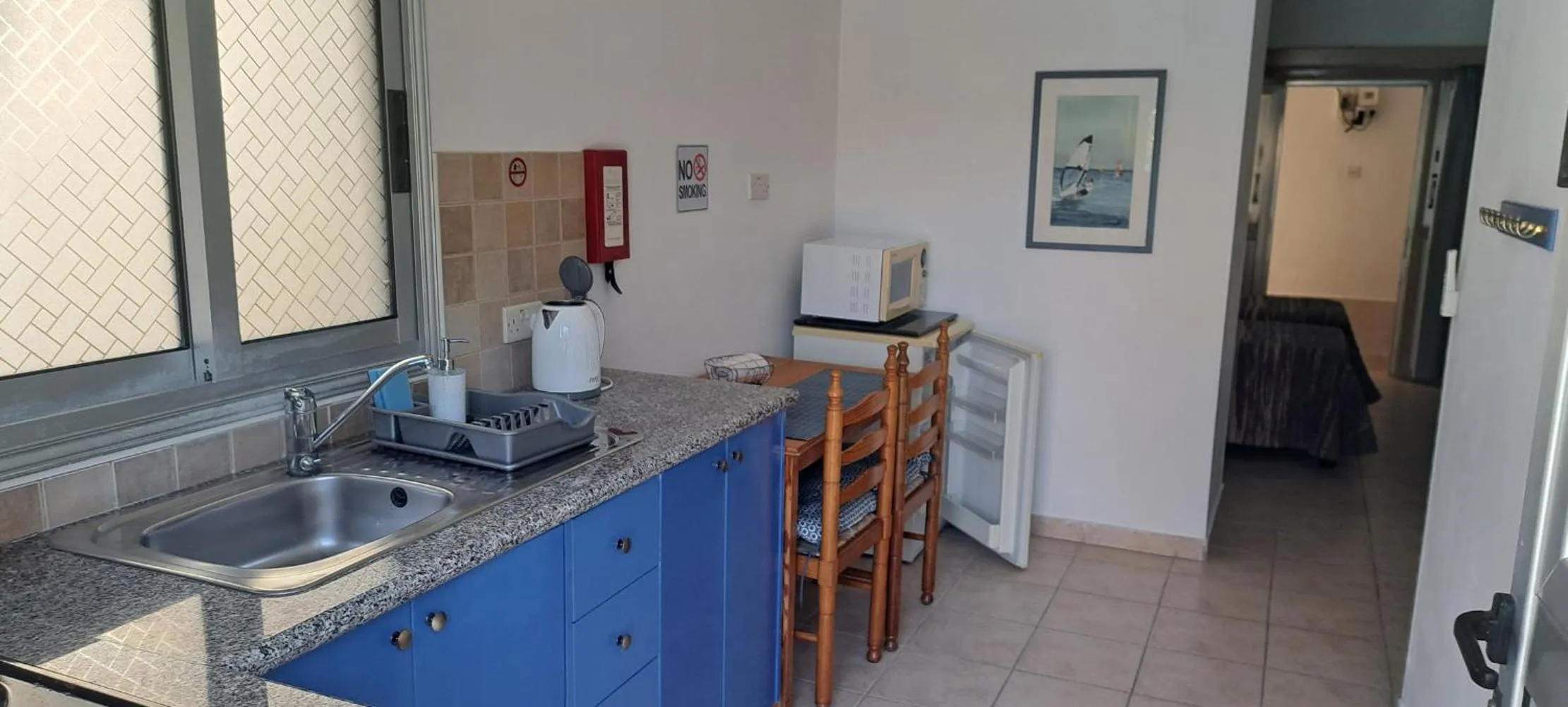 Kitchen or kitchenette in C & A Hotel Apartments