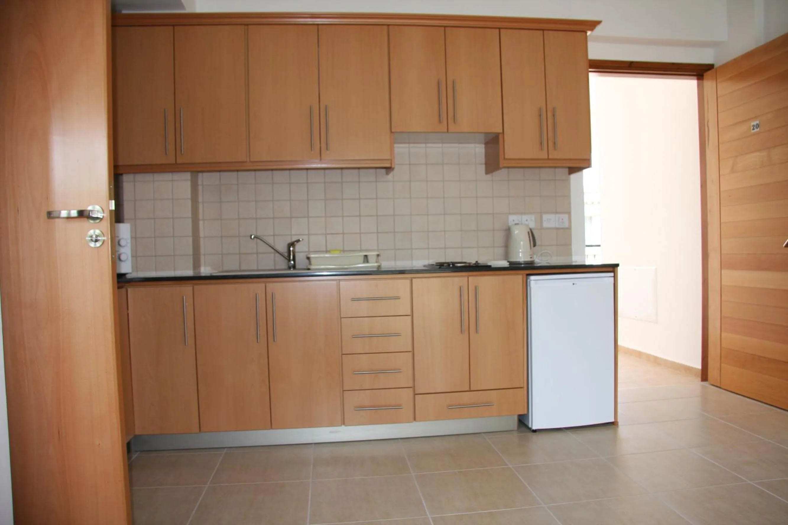 Kitchen or kitchenette in C & A Hotel Apartments