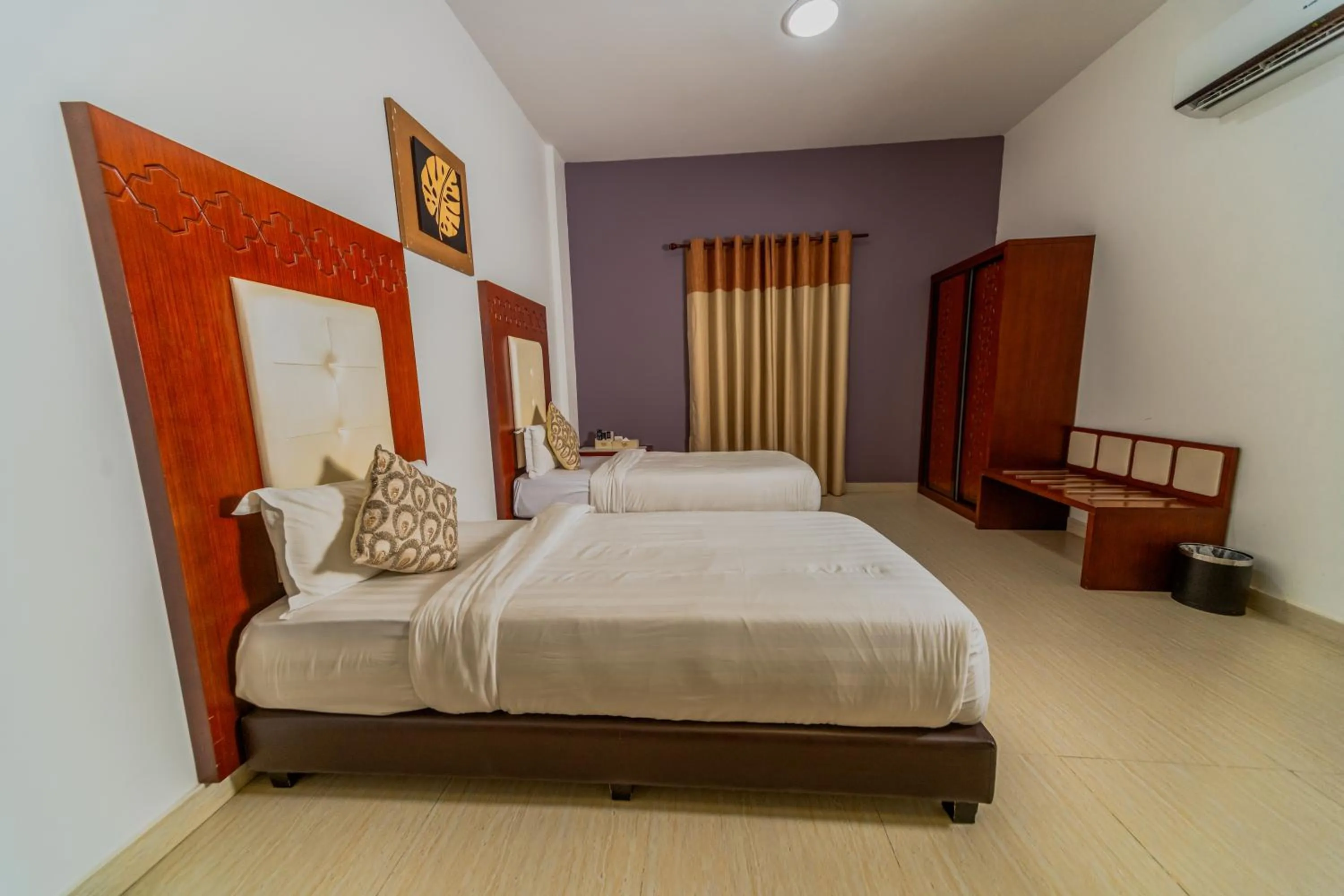 Bed in Zaki Hotel Apartment