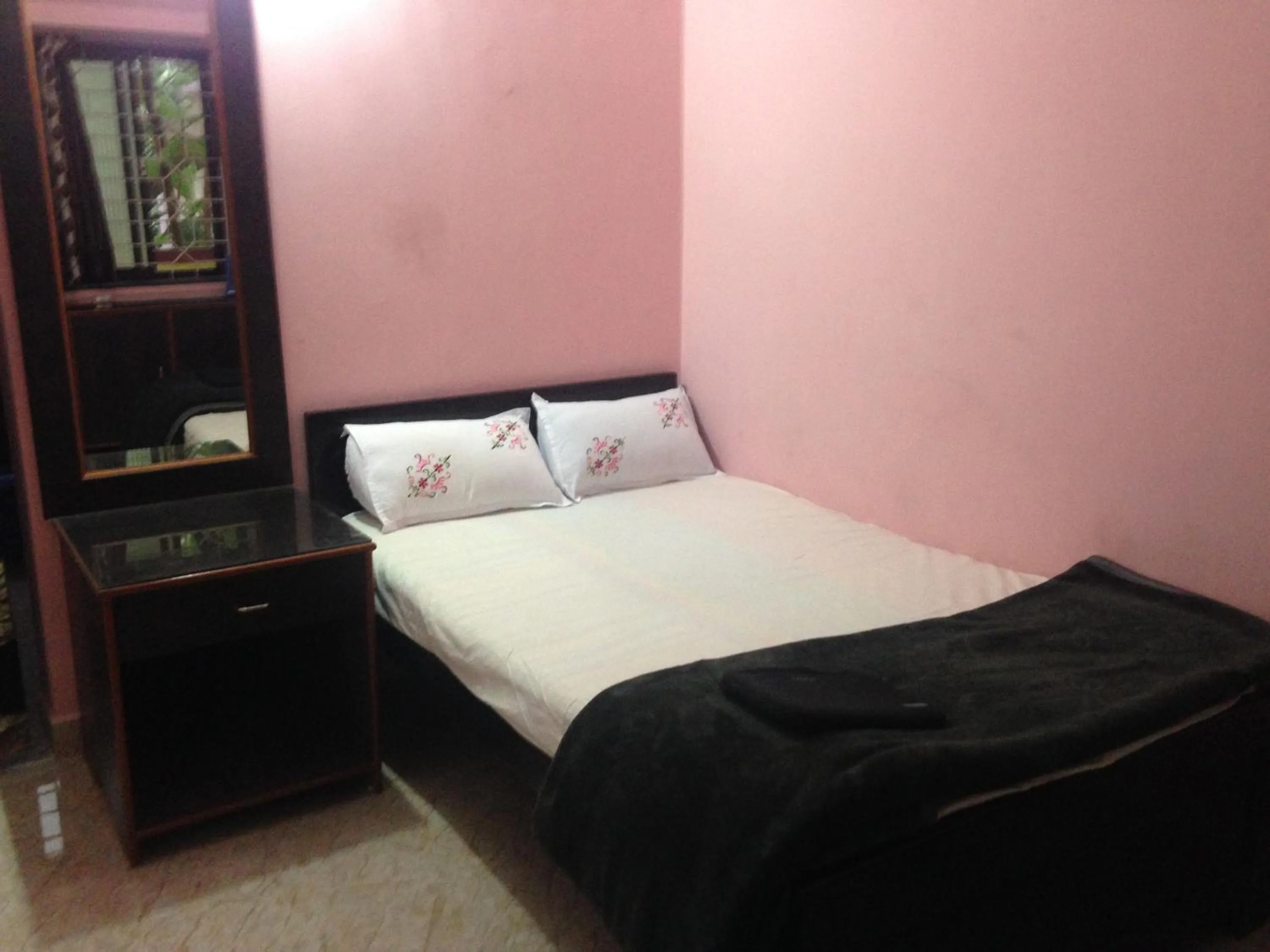 Bed in All Seasons Guest House