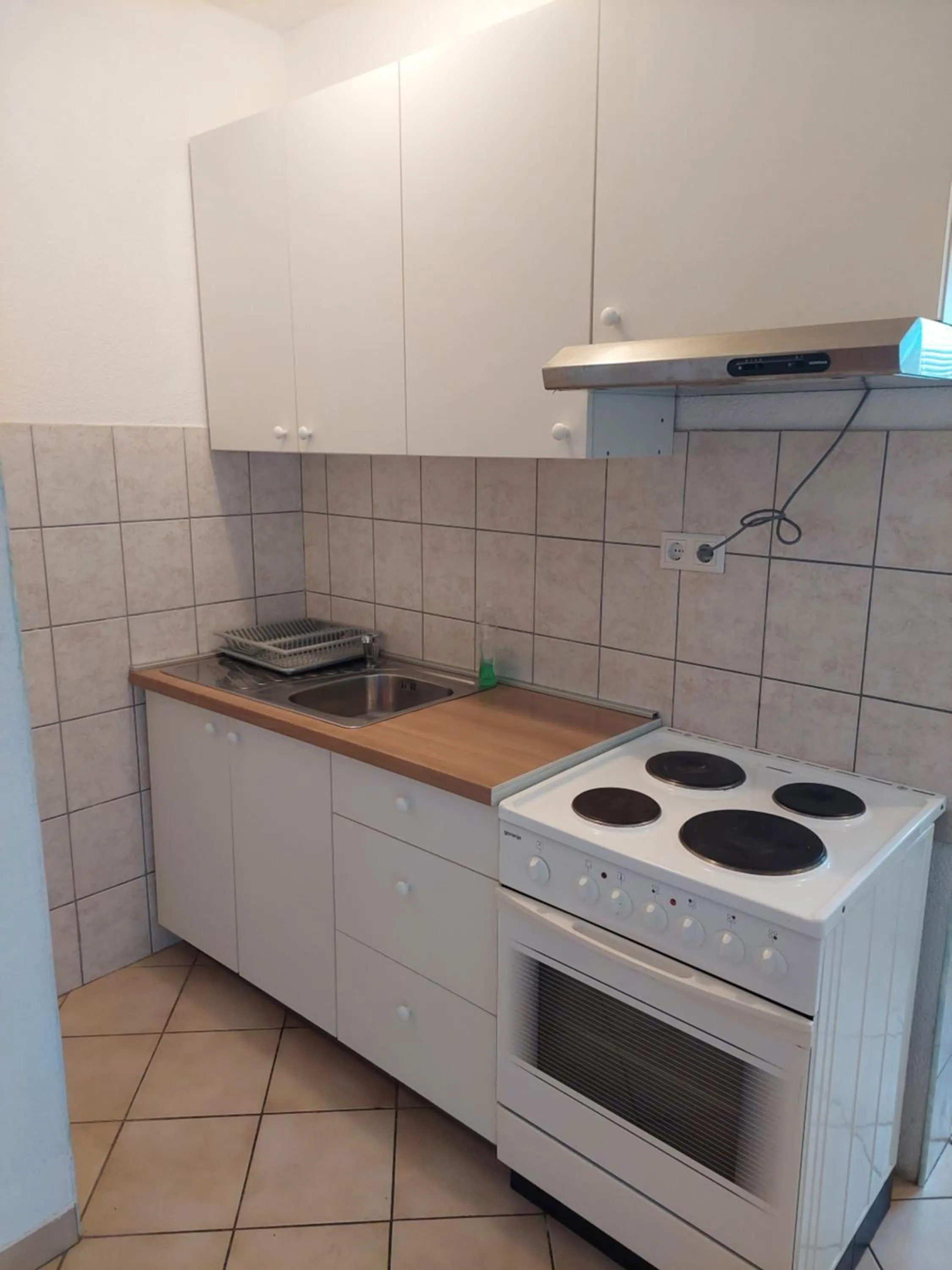 Kitchen or kitchenette in Royal Apartments