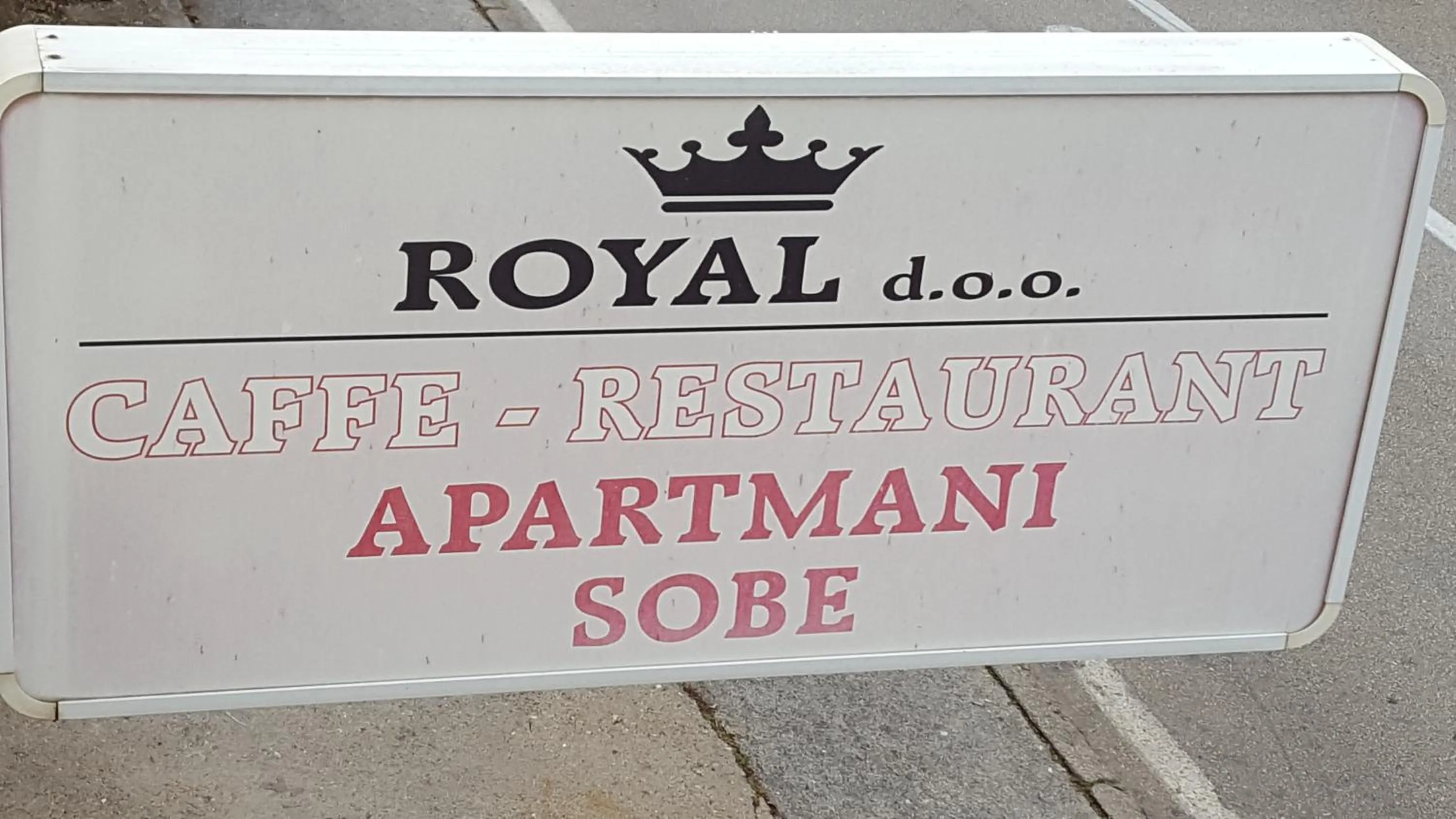 Property logo or sign in Royal Apartments