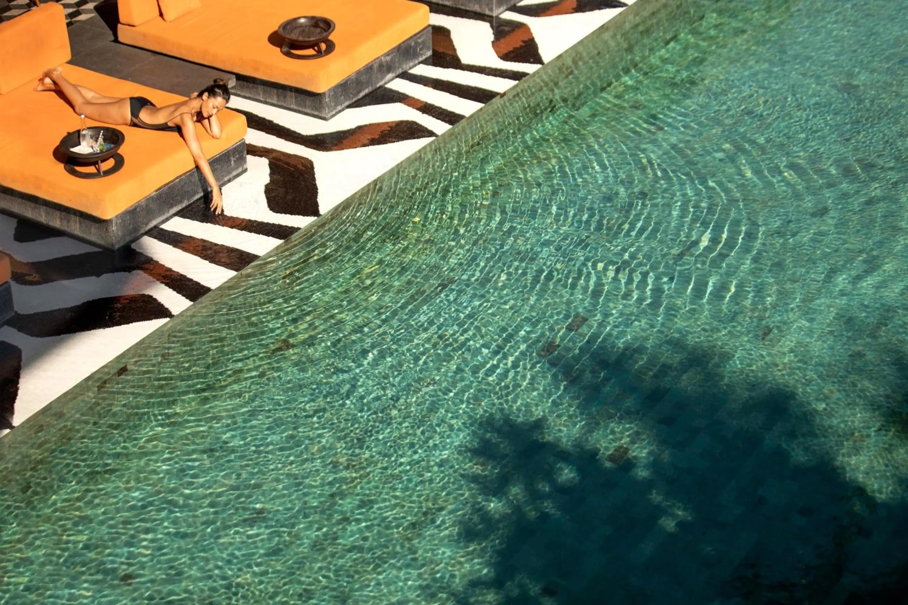 Swimming pool in Hotel Indigo Bali Seminyak Beach by IHG