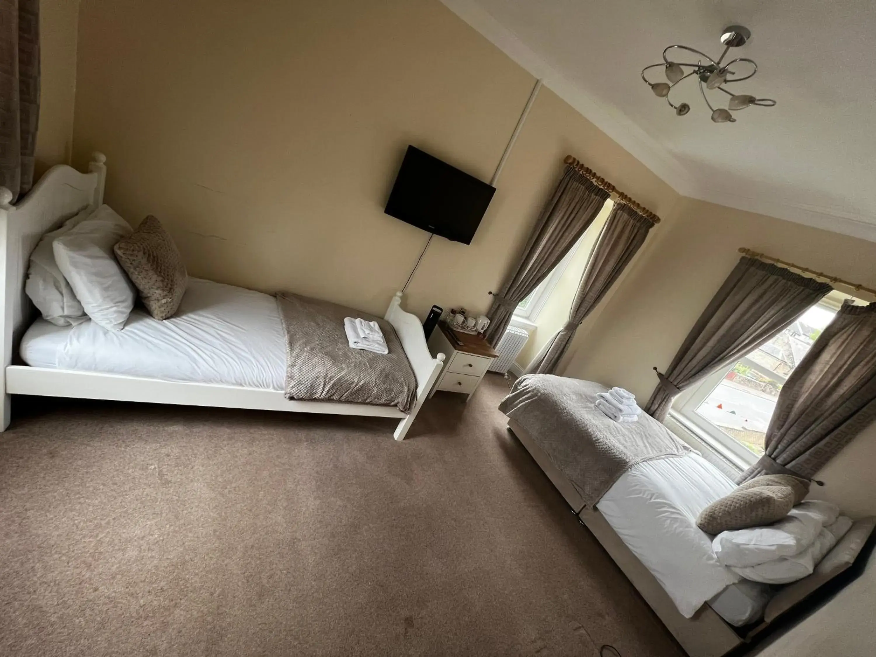 Bed in The Village Inn Bed in The Village Inn