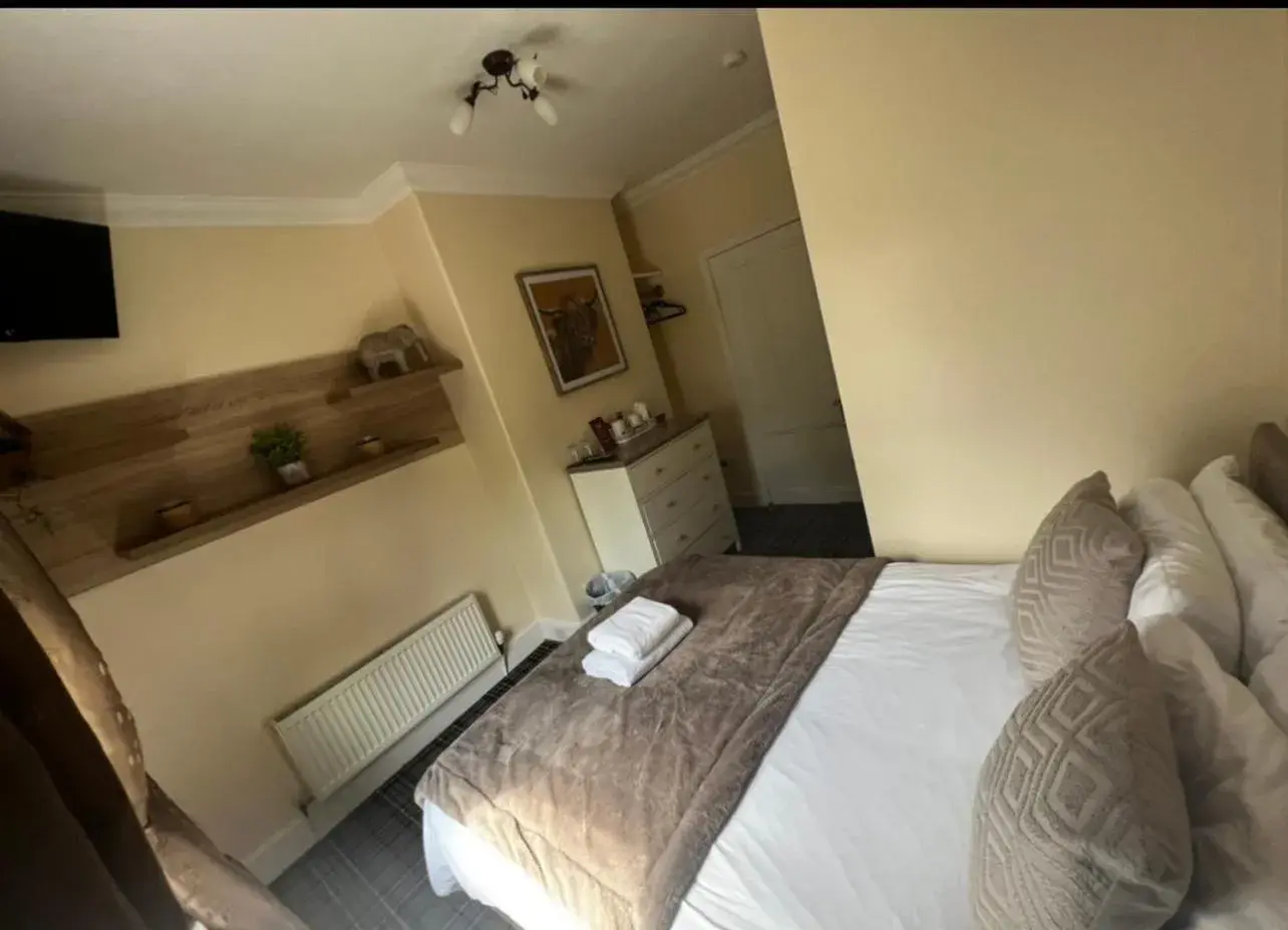 Bed in The Village Inn Bed in The Village Inn