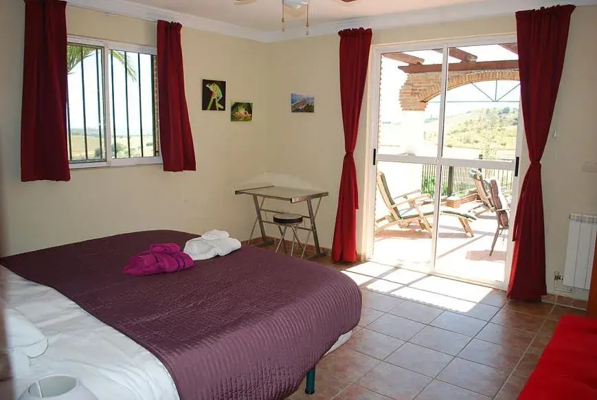 Triple Room with Bathroom in Bed & Breakfast Finca de los Sueños Triple Room with Bathroom in Bed & Breakfast Finca de los Sueños