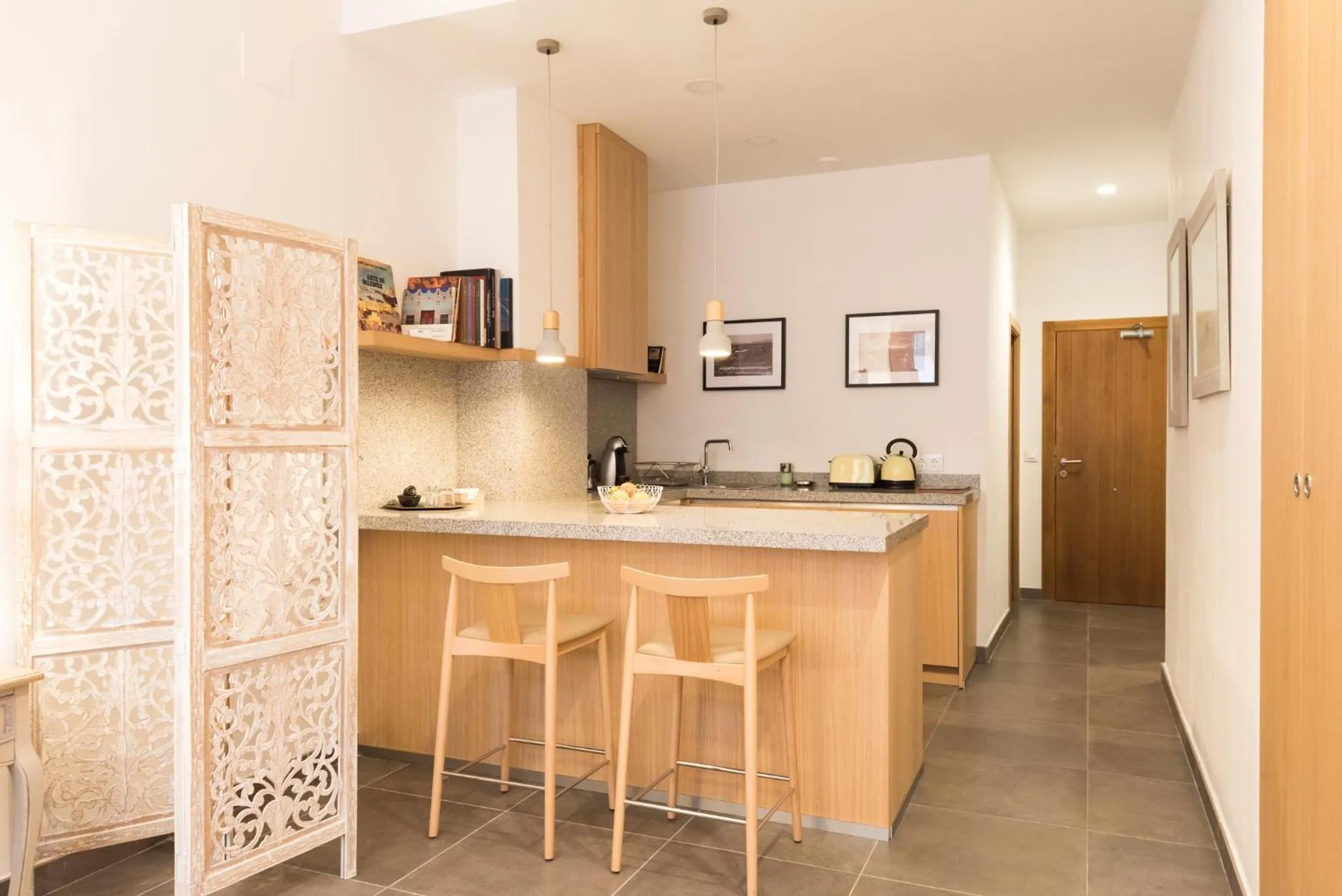 Kitchen or kitchenette in Barracart Apartments