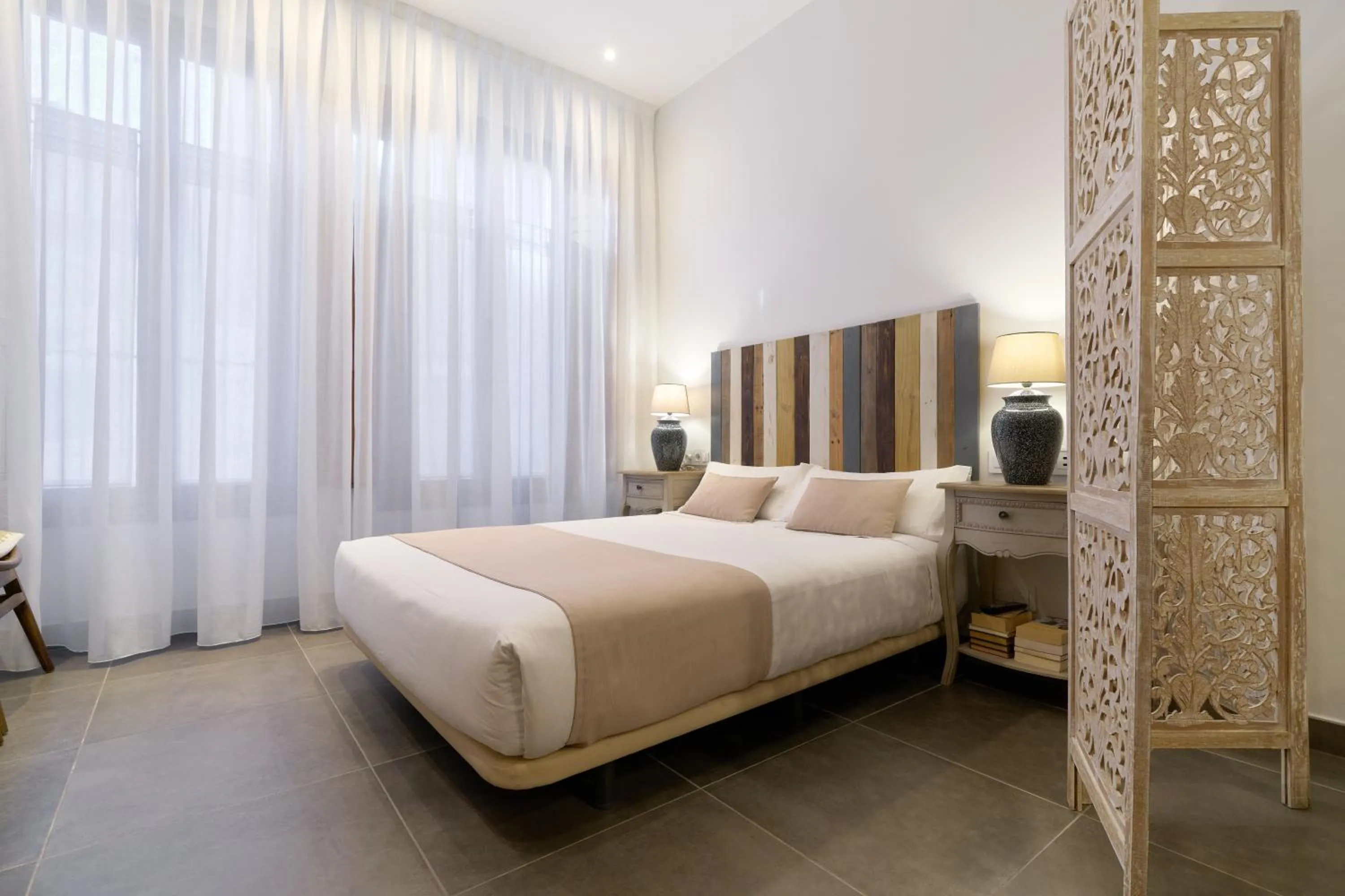 Bed in Barracart Apartments