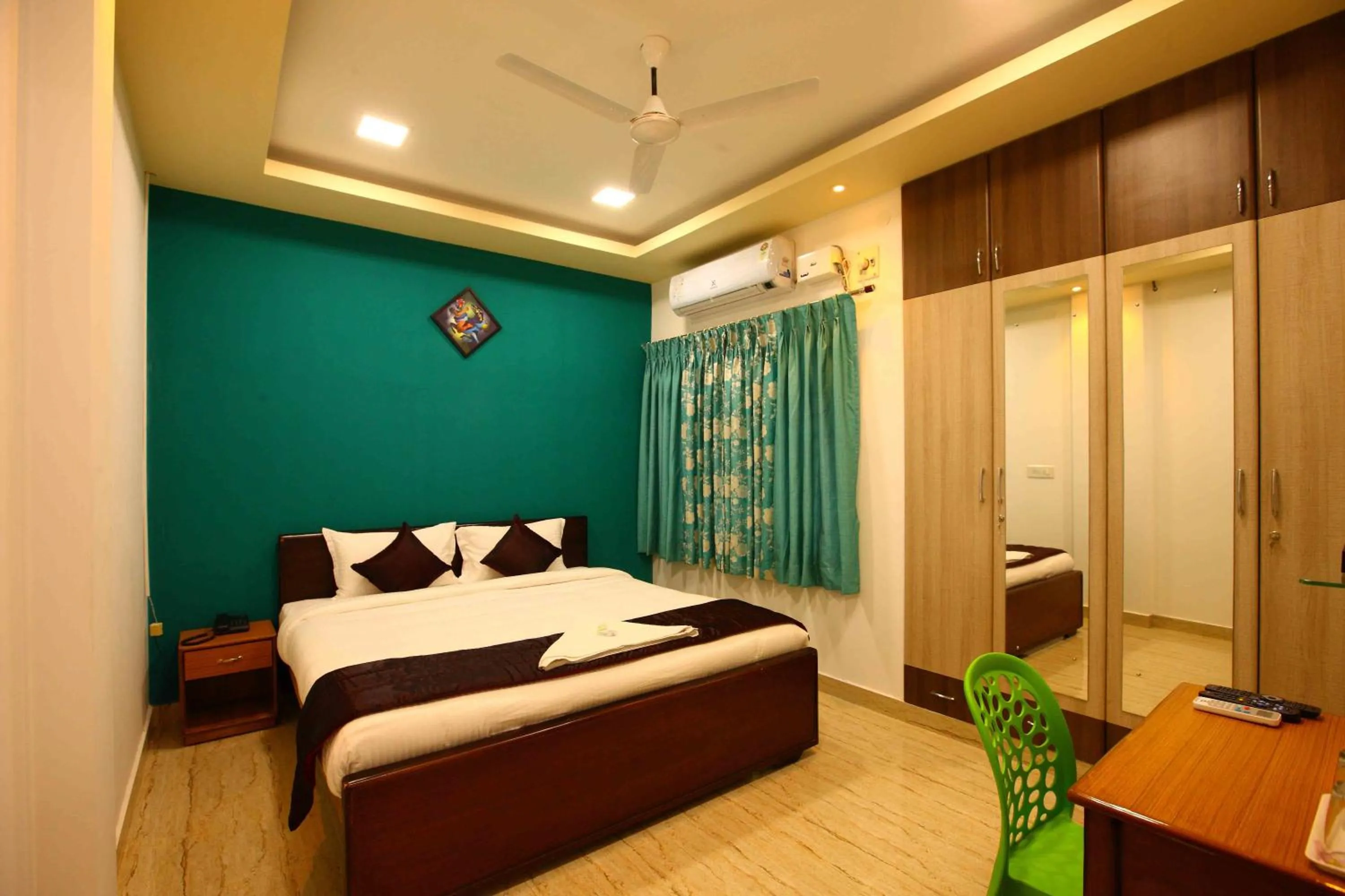 Photo of the whole room, Bed in Sreedevi Residency