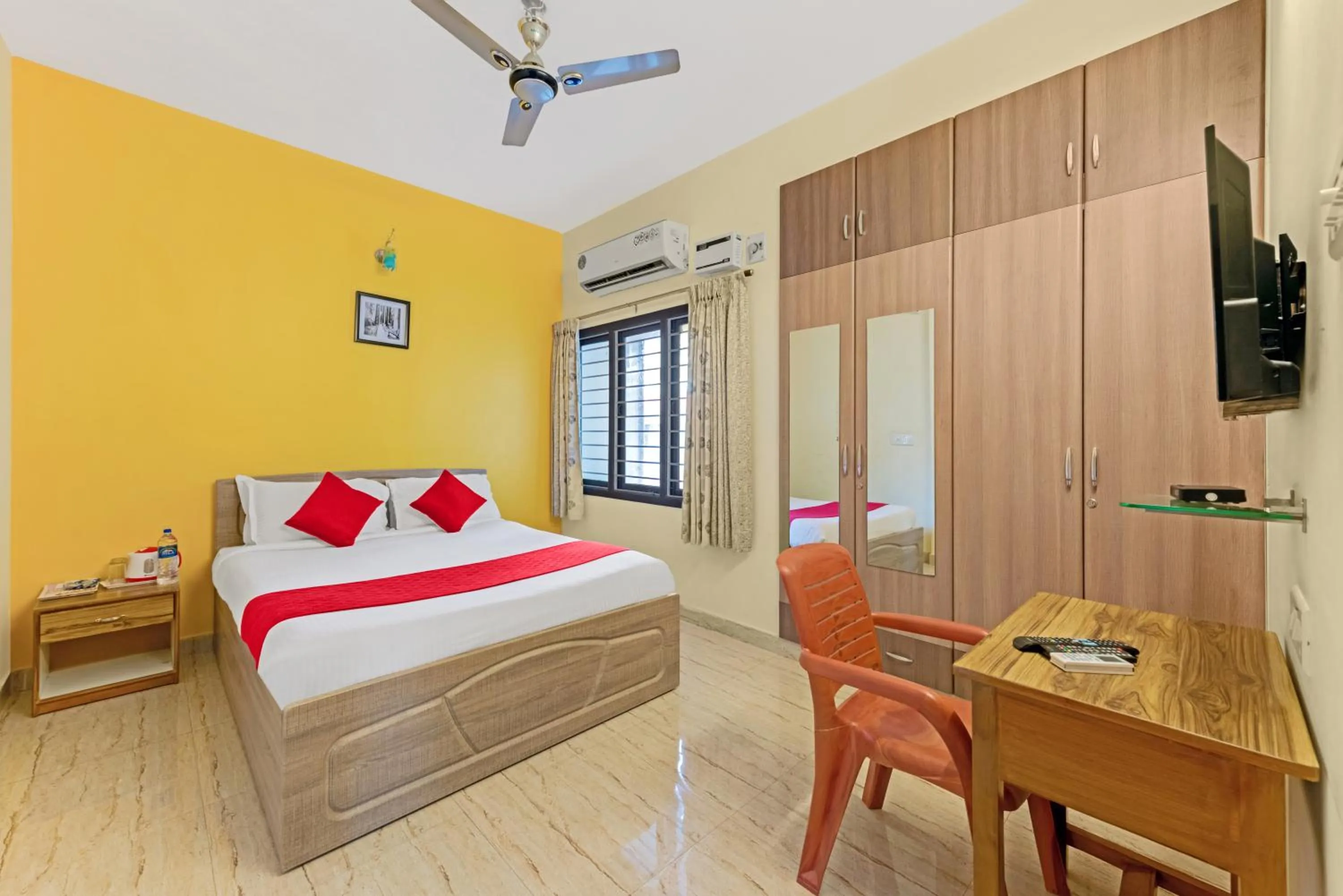 Photo of the whole room, Bed in Sreedevi Residency