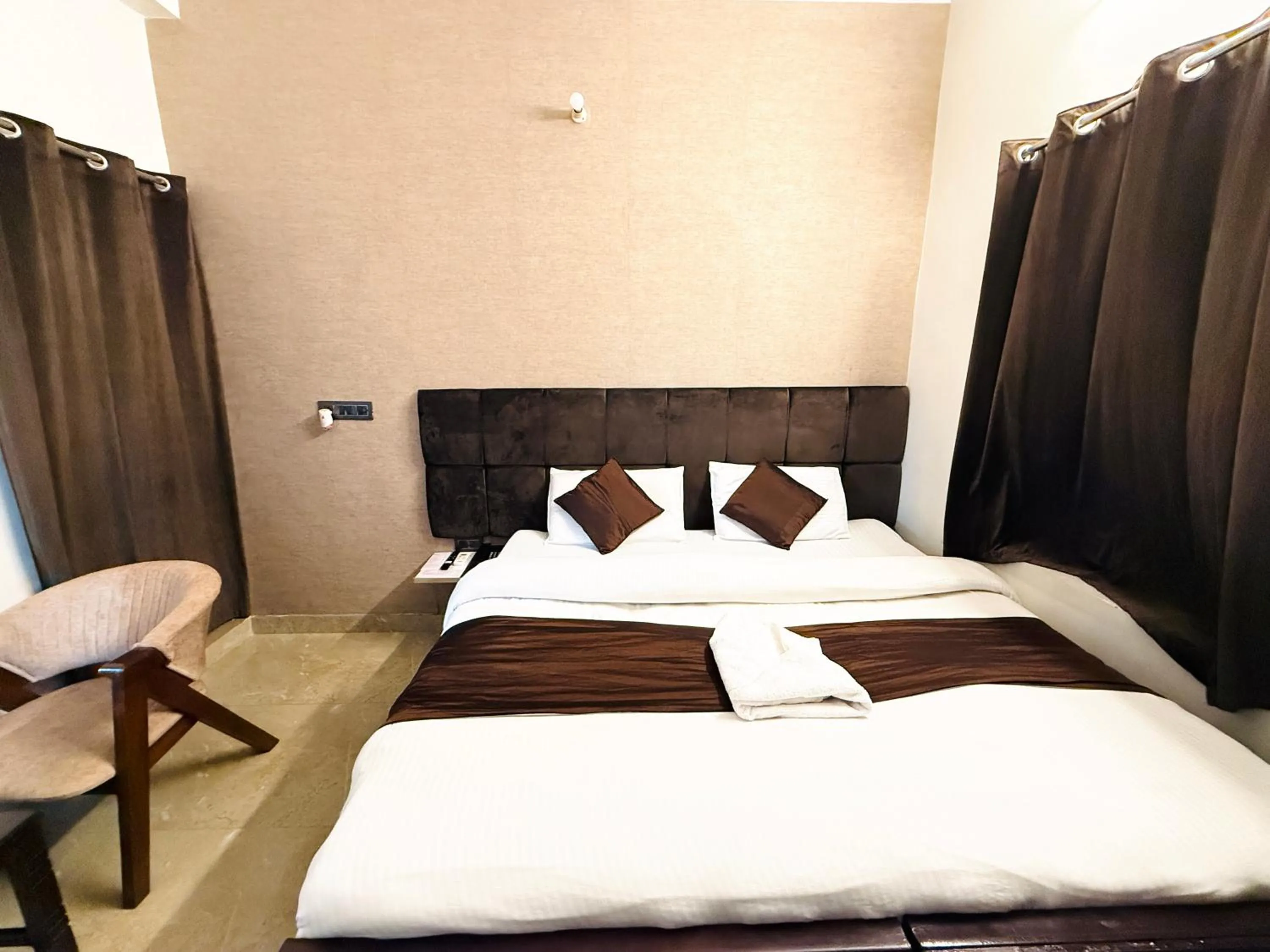 Bed in Krishna Residency - A Boutique Hotel