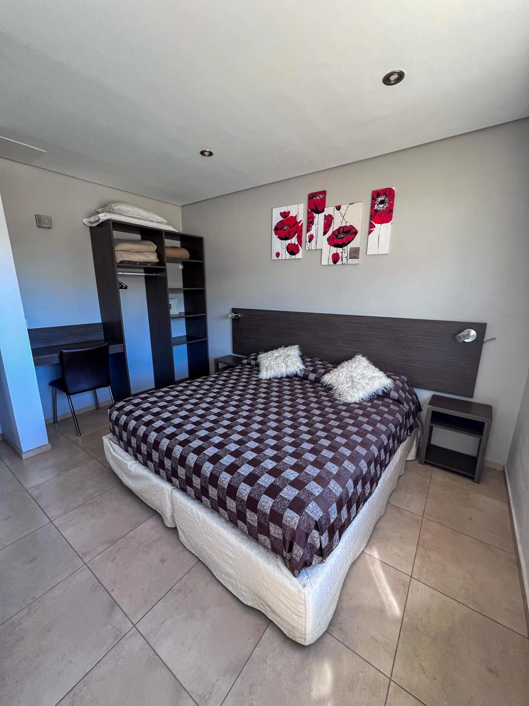 Bedroom, Bed in Tierra Tehuelche Hostería y Aparts