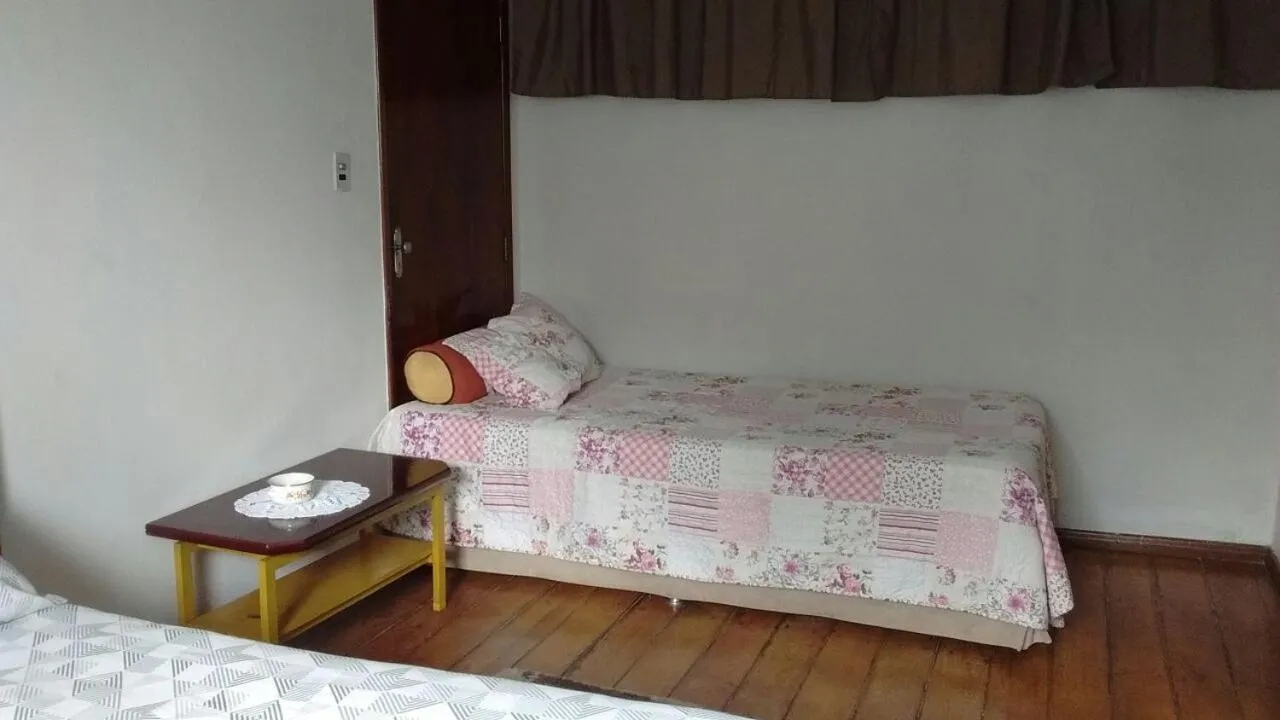 Bed in Pousada Ana Poipa