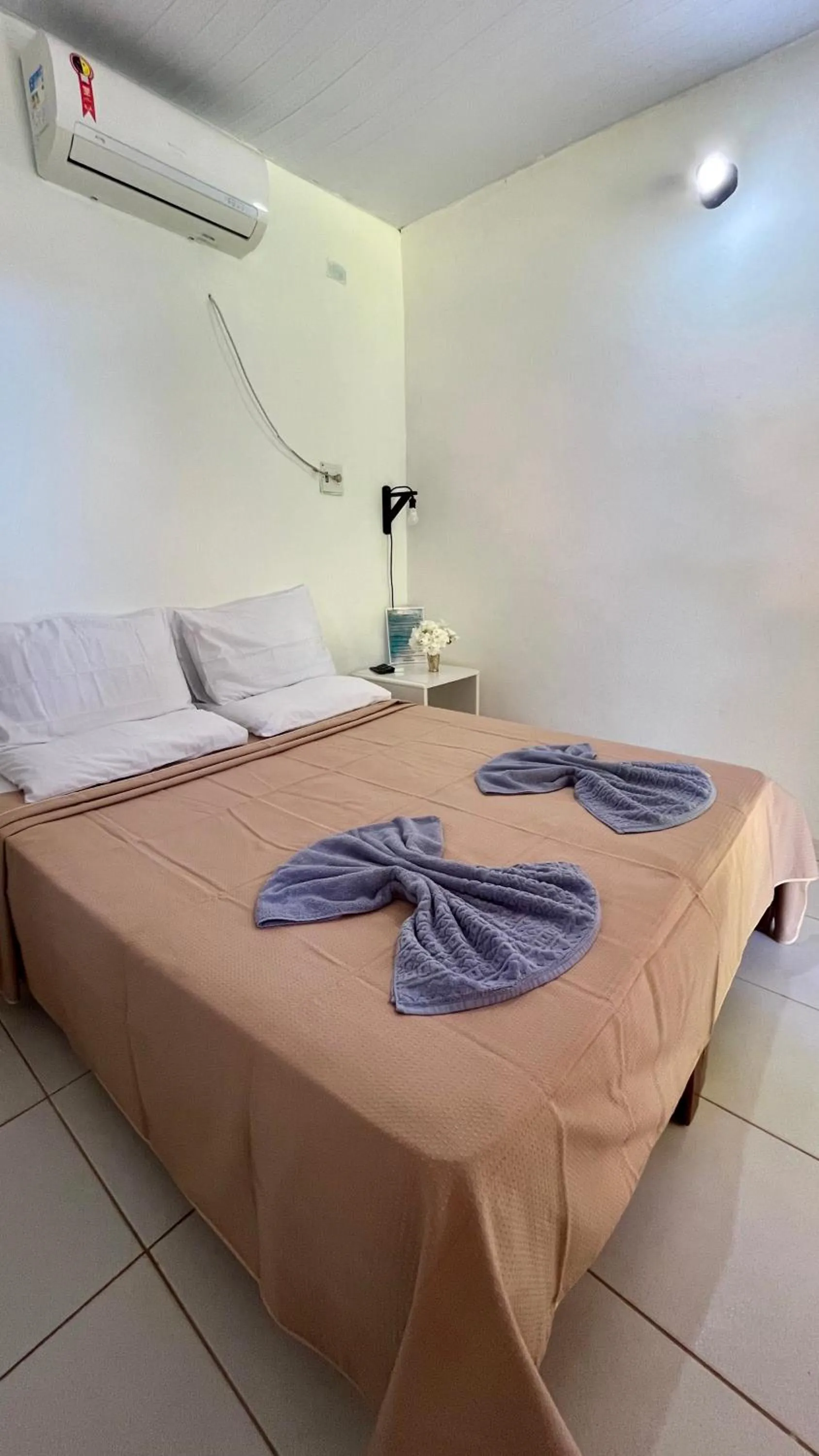 Bed in Pousada Estrela do Mar