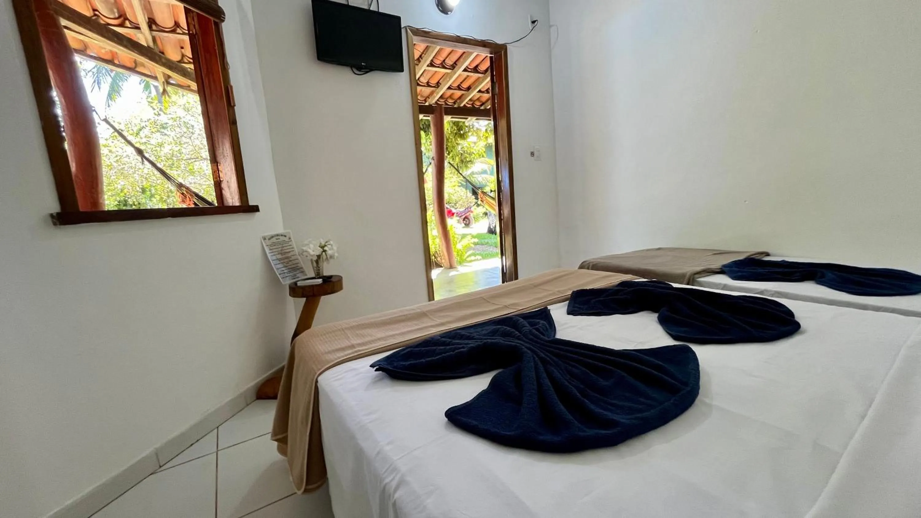 Bed in Pousada Estrela do Mar