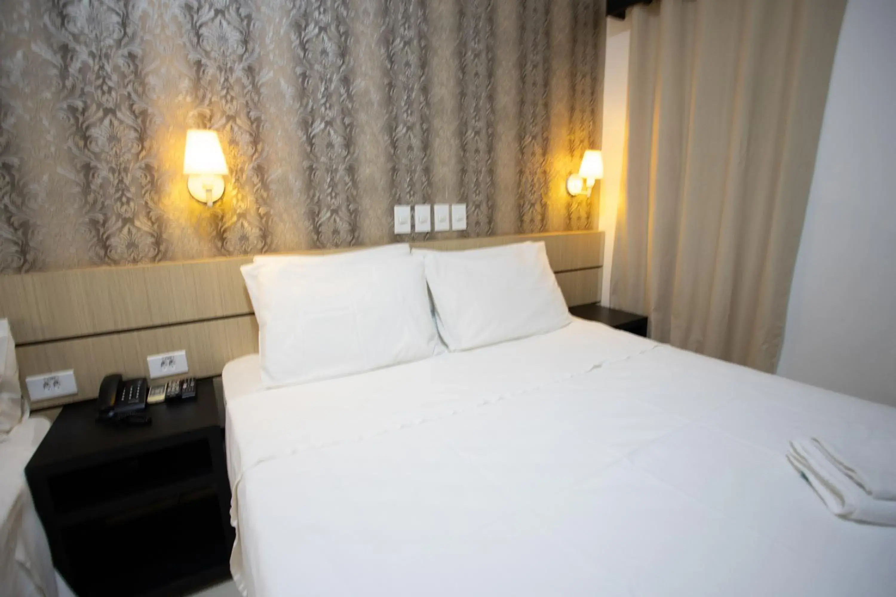 Bed in Ellus Hotel Bed in Ellus Hotel