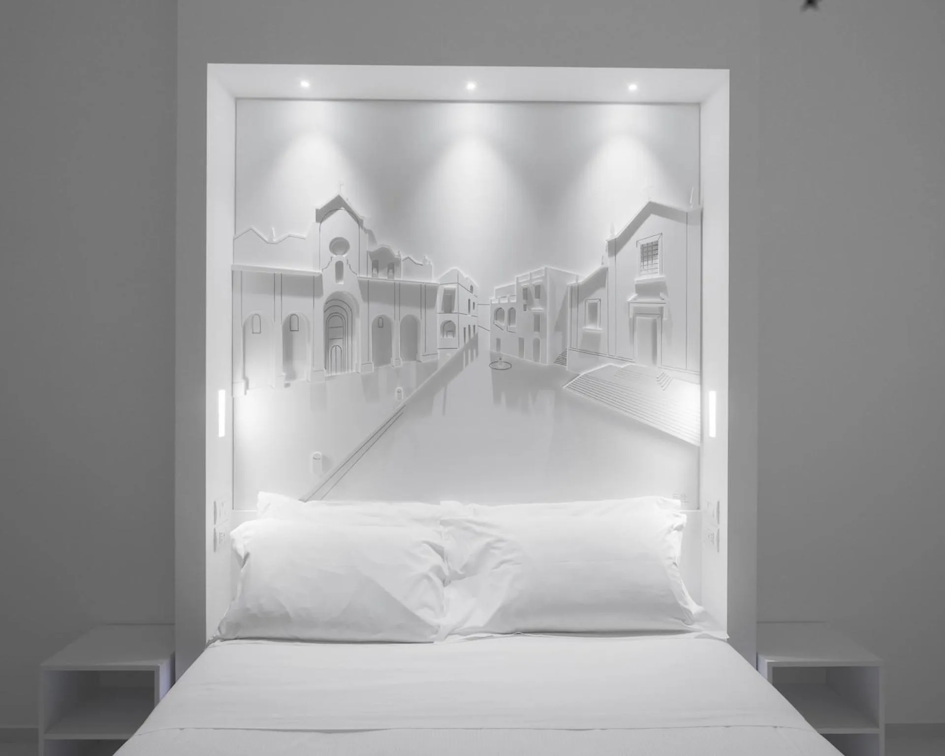 Bed in Vittorio Veneto Matera Luxury Rooms