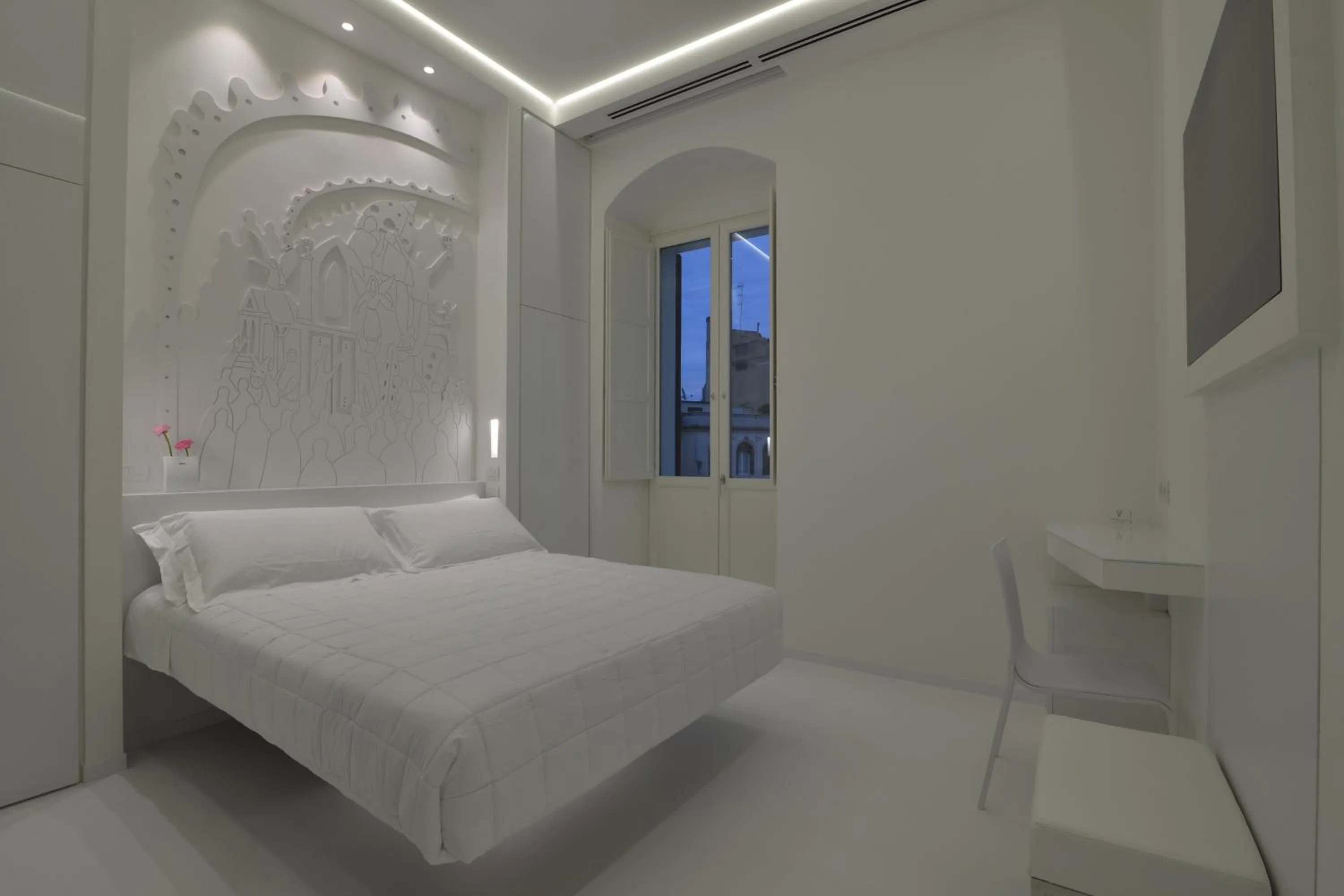 Photo of the whole room, Bed in Vittorio Veneto Matera Luxury Rooms