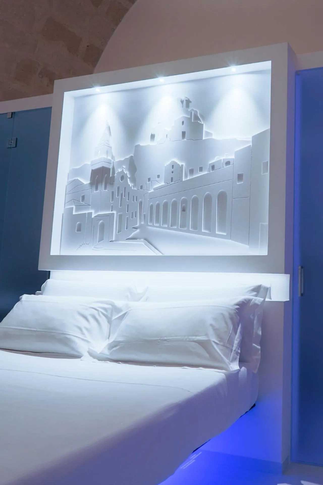 Bed in Vittorio Veneto Matera Luxury Rooms