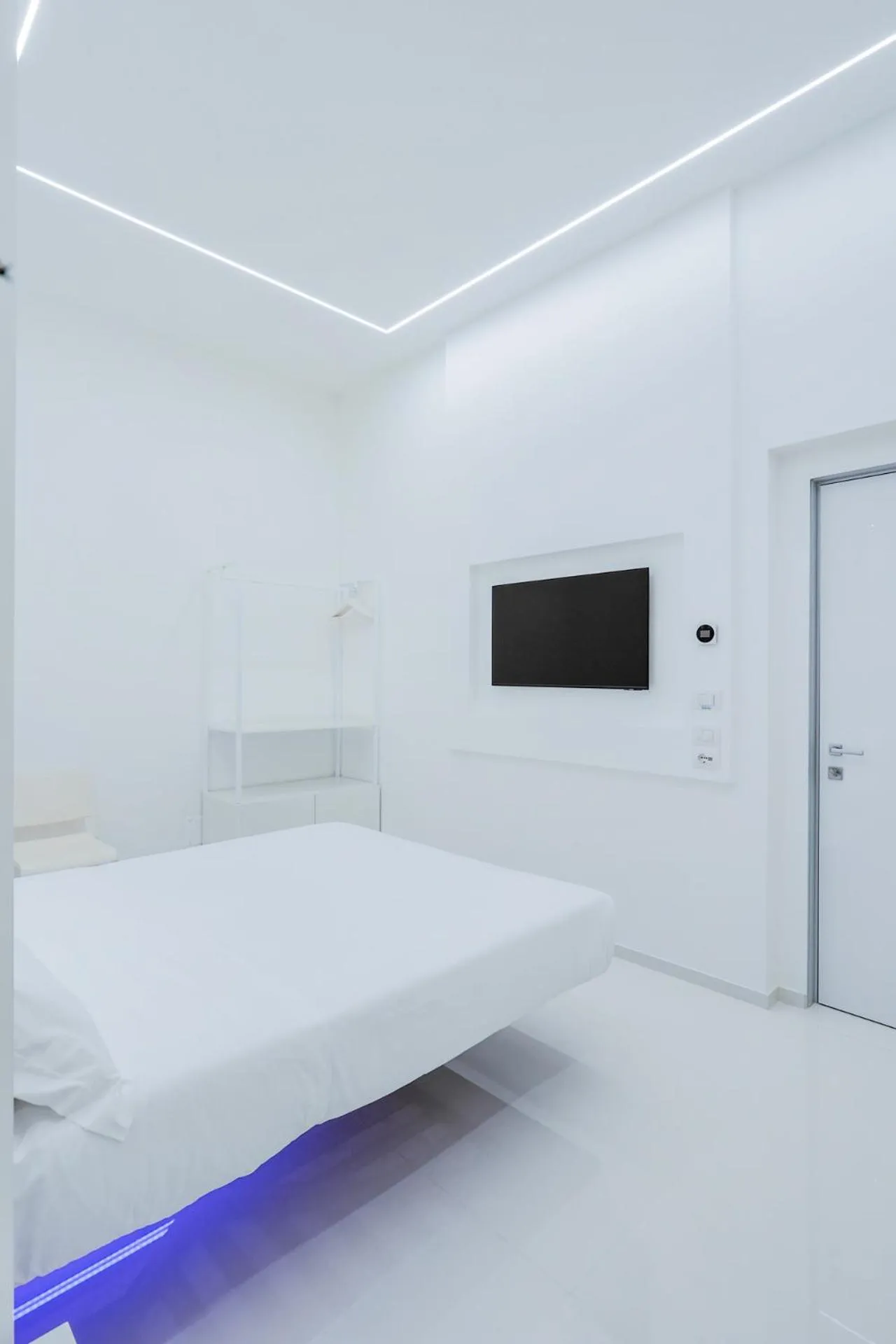 Bed in Vittorio Veneto Matera Luxury Rooms