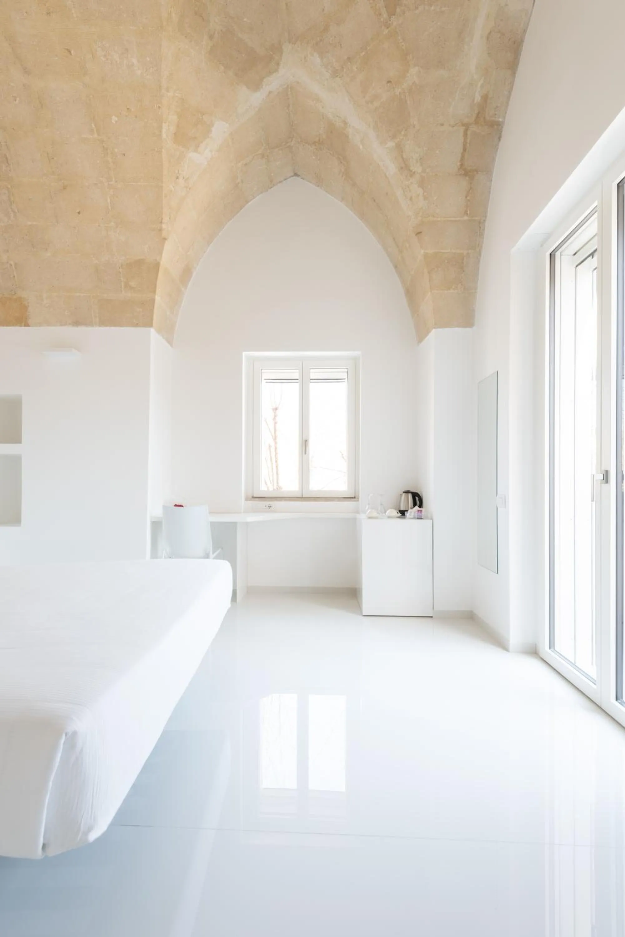 Bed in Vittorio Veneto Matera Luxury Rooms