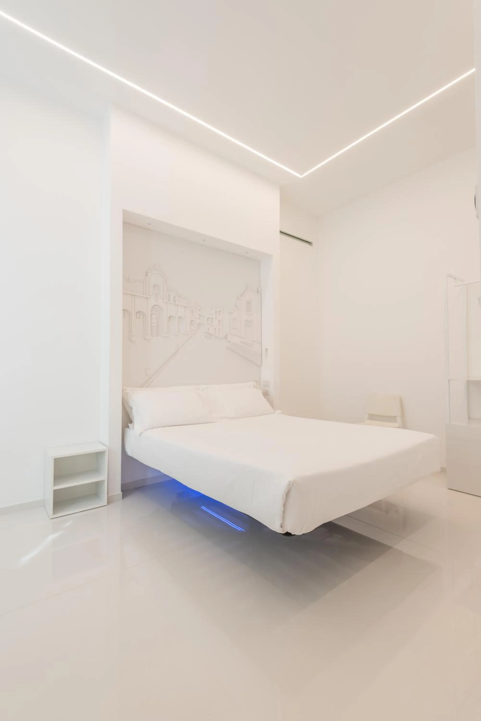 Bed in Vittorio Veneto Matera Luxury Rooms