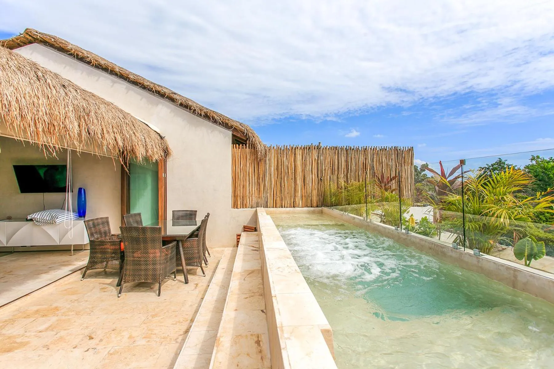 Swimming pool in Eco-chic Design Condos Wrapped in Nature's Elements by Stella Rentals