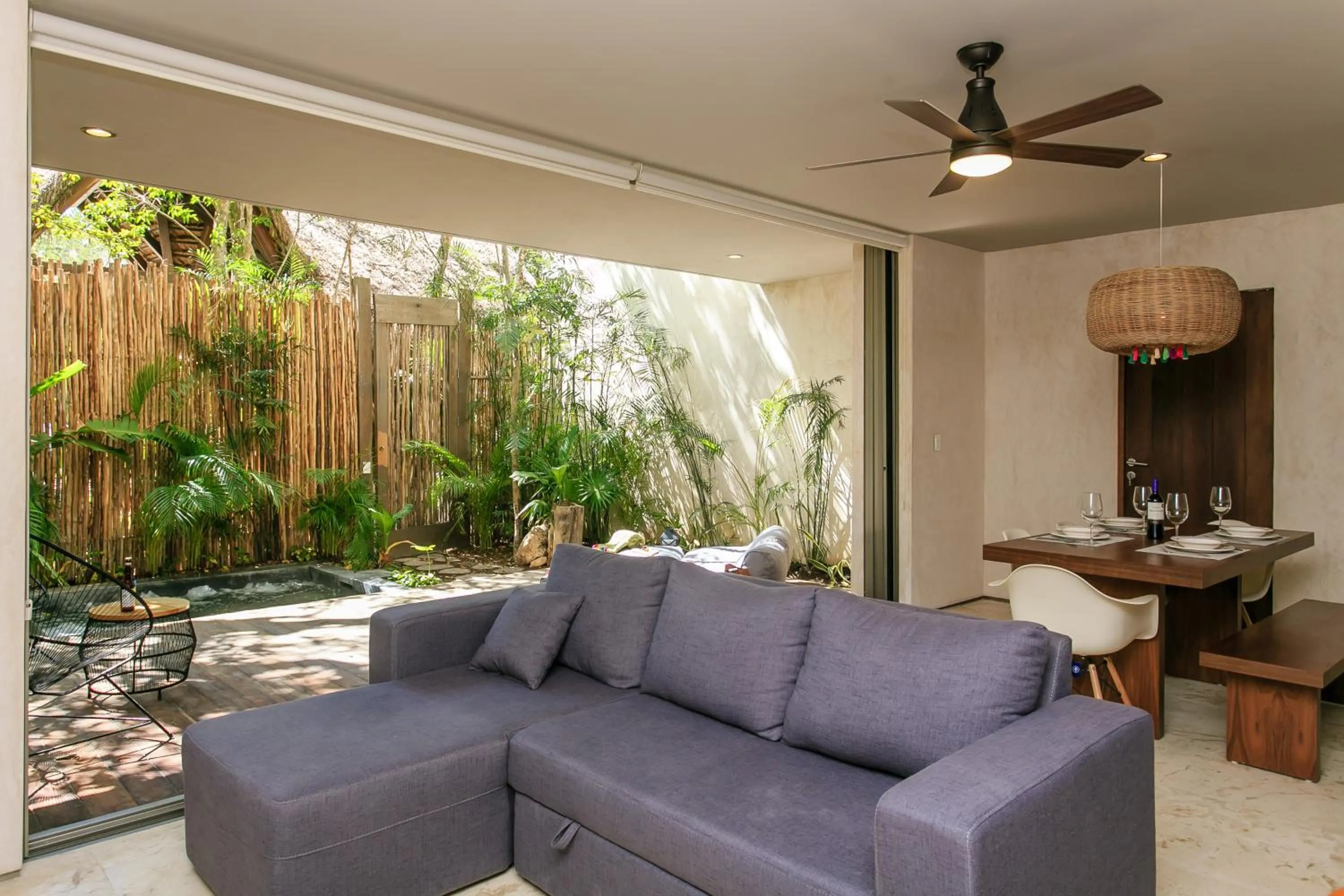 Balcony/Terrace in Eco-chic Design Condos Wrapped in Nature's Elements by Stella Rentals