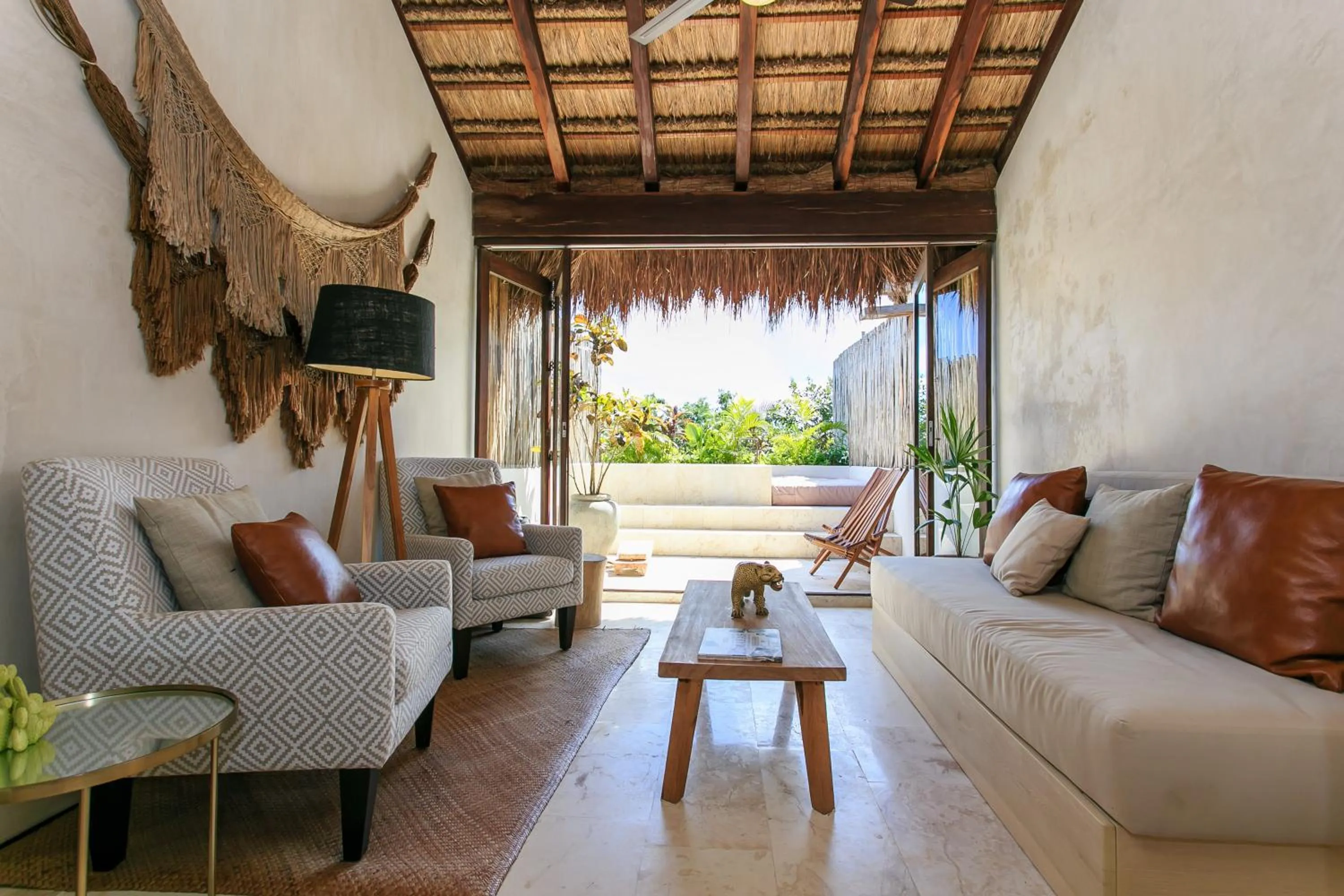 Balcony/Terrace in Eco-chic Design Condos Wrapped in Nature's Elements by Stella Rentals