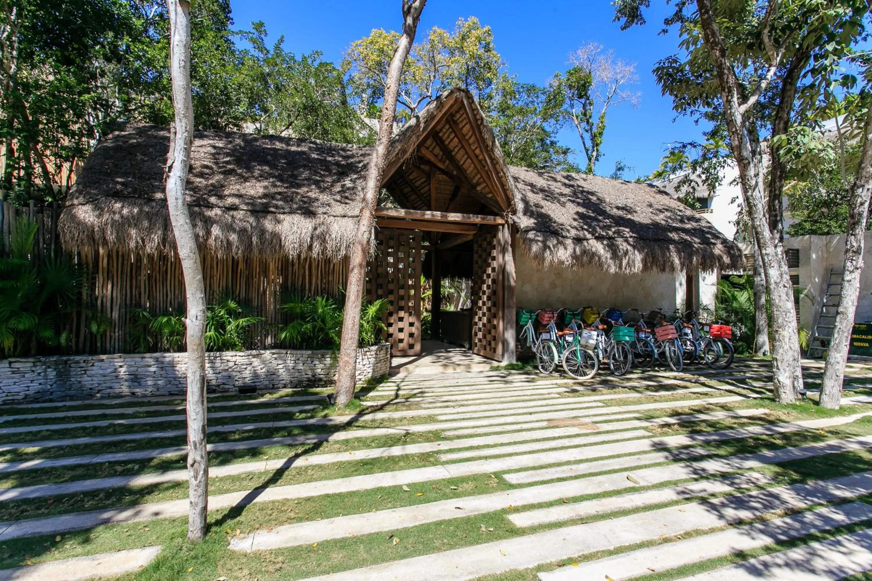 Facade/entrance in Eco-chic Design Condos Wrapped in Nature's Elements by Stella Rentals