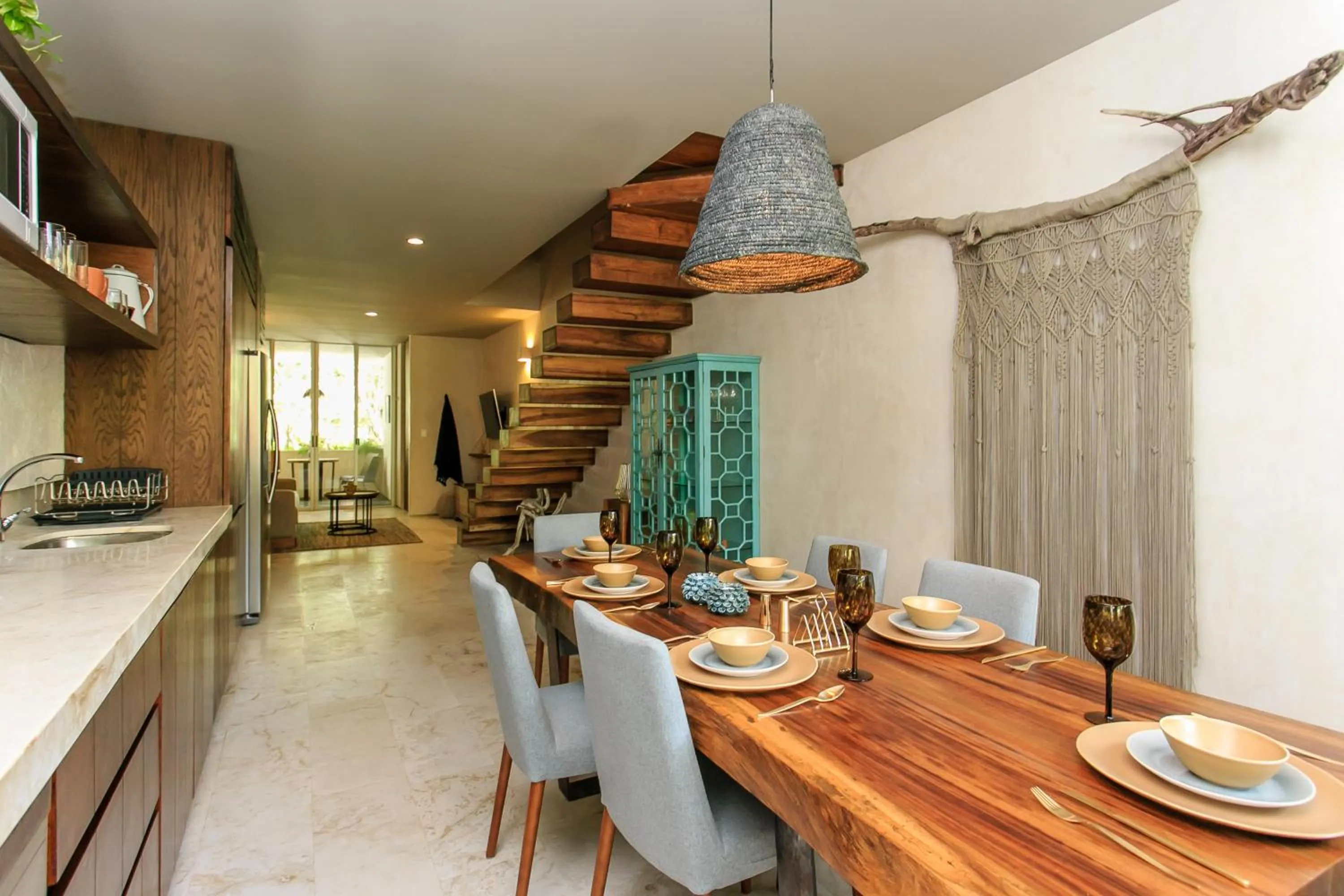 Kitchen or kitchenette in Eco-chic Design Condos Wrapped in Nature's Elements by Stella Rentals