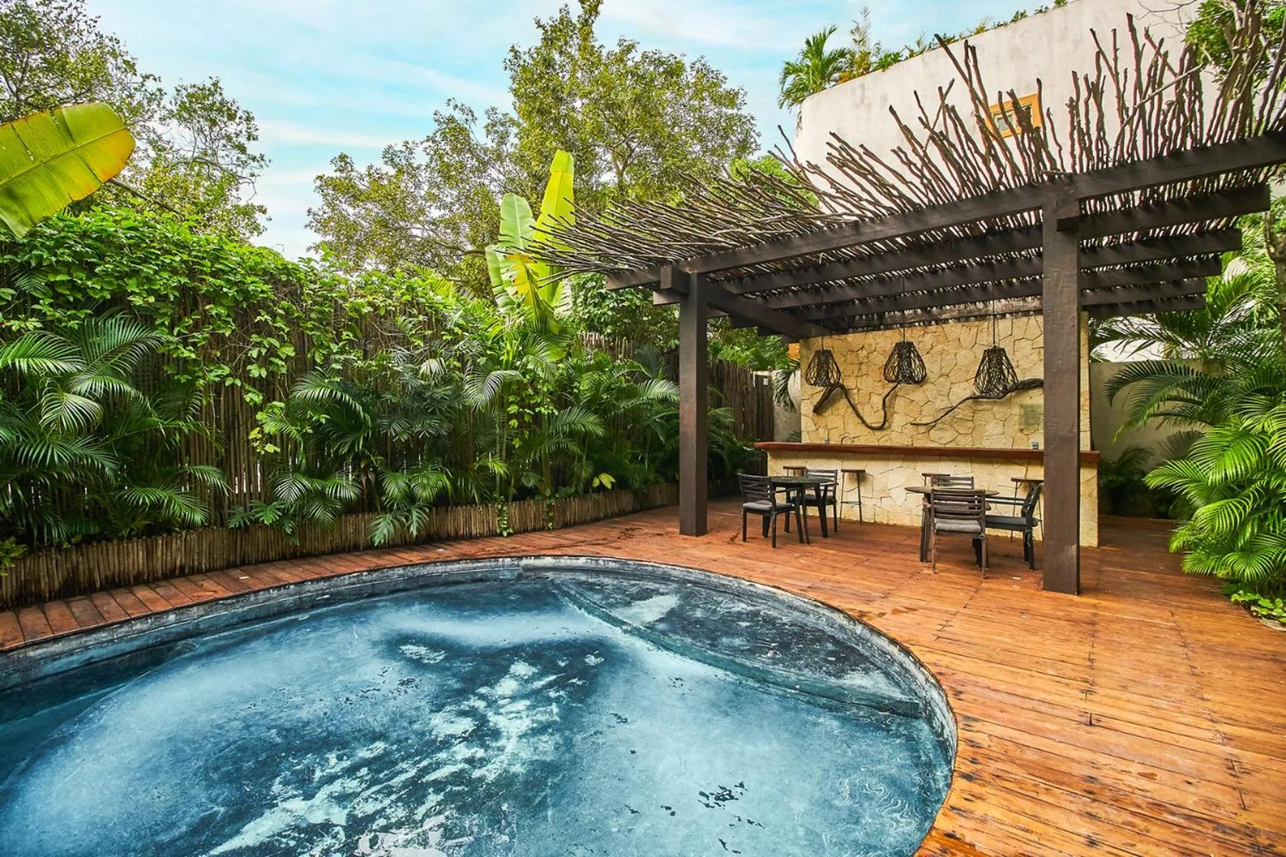 Swimming pool in Eco-chic Design Condos Wrapped in Nature's Elements by Stella Rentals