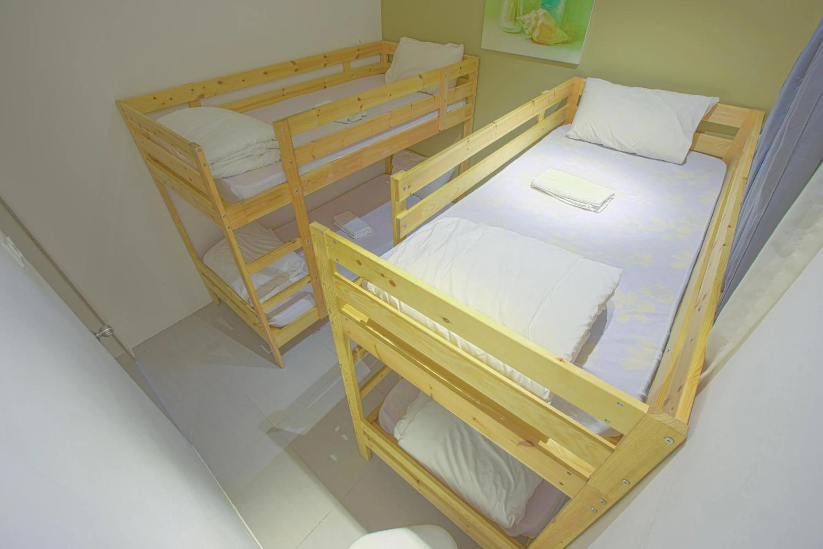 Bed in DreamScape Apartment @ Golden Hill