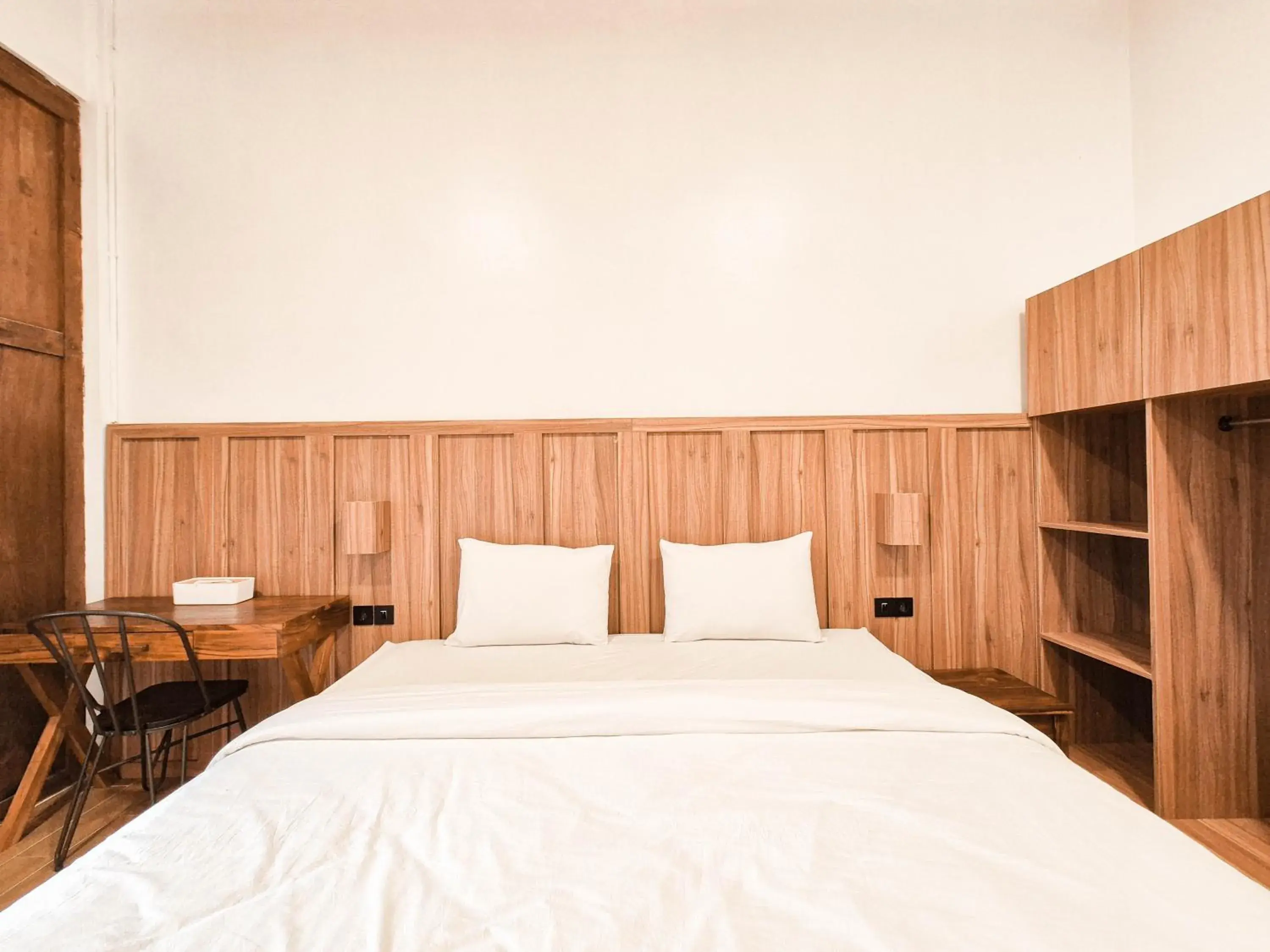 Bed in Pendhapa Art Space - PAS Limasan Homestay Bed in Pendhapa Art Space - PAS Limasan Homestay