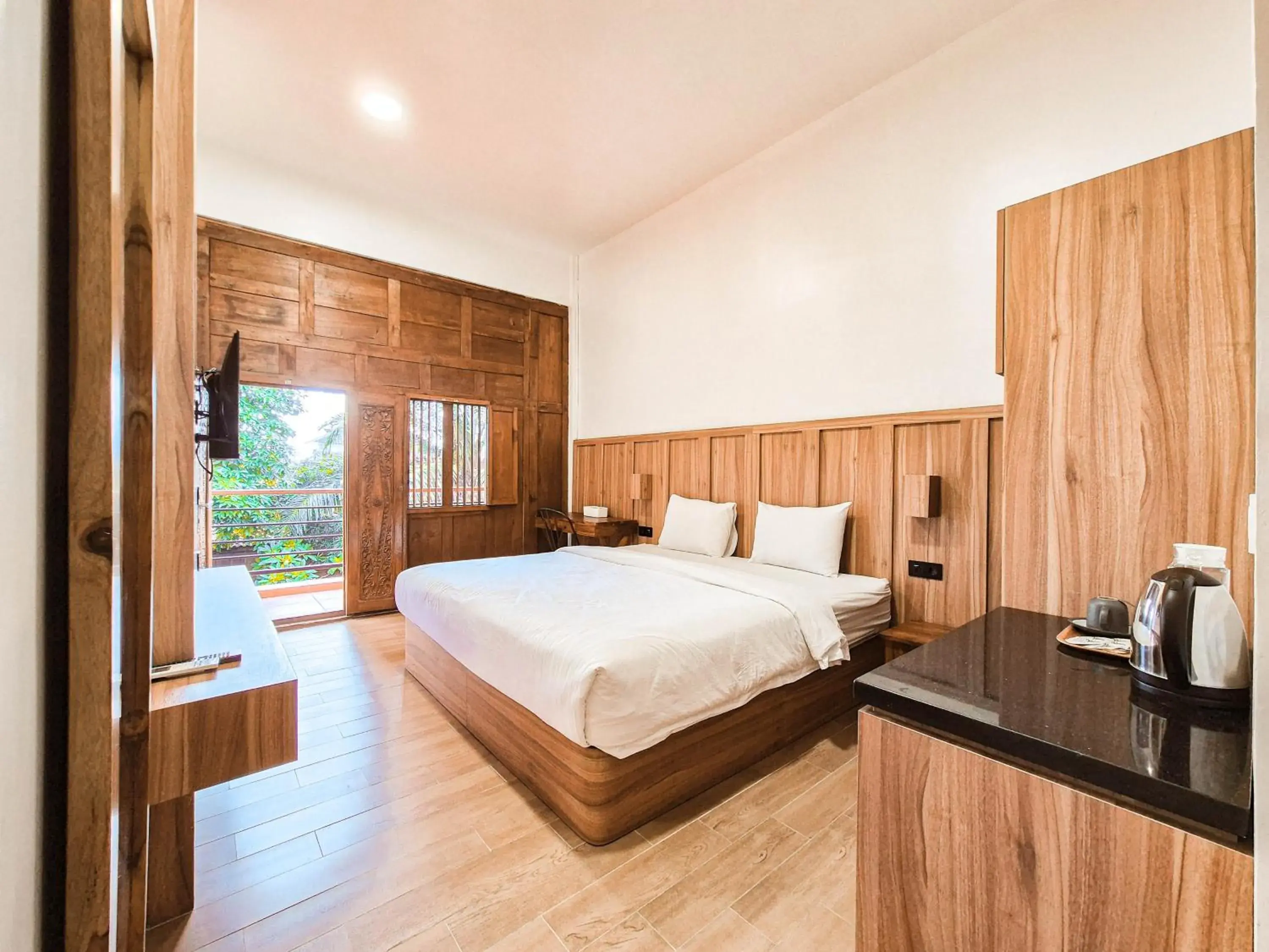 Bed in Pendhapa Art Space - PAS Limasan Homestay Bed in Pendhapa Art Space - PAS Limasan Homestay