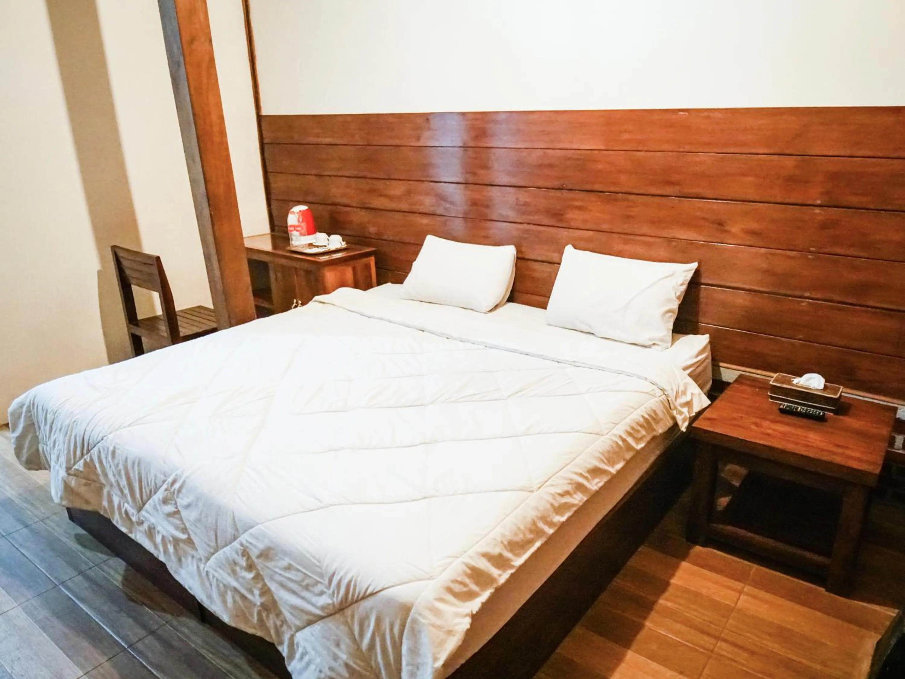 Bed in Pendhapa Art Space - PAS Limasan Homestay
