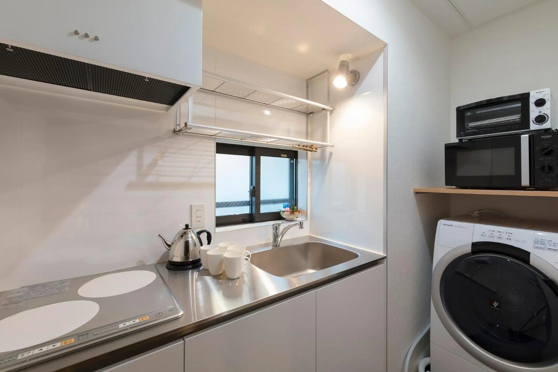 Kitchen or kitchenette in Yoshimigura Machiya House