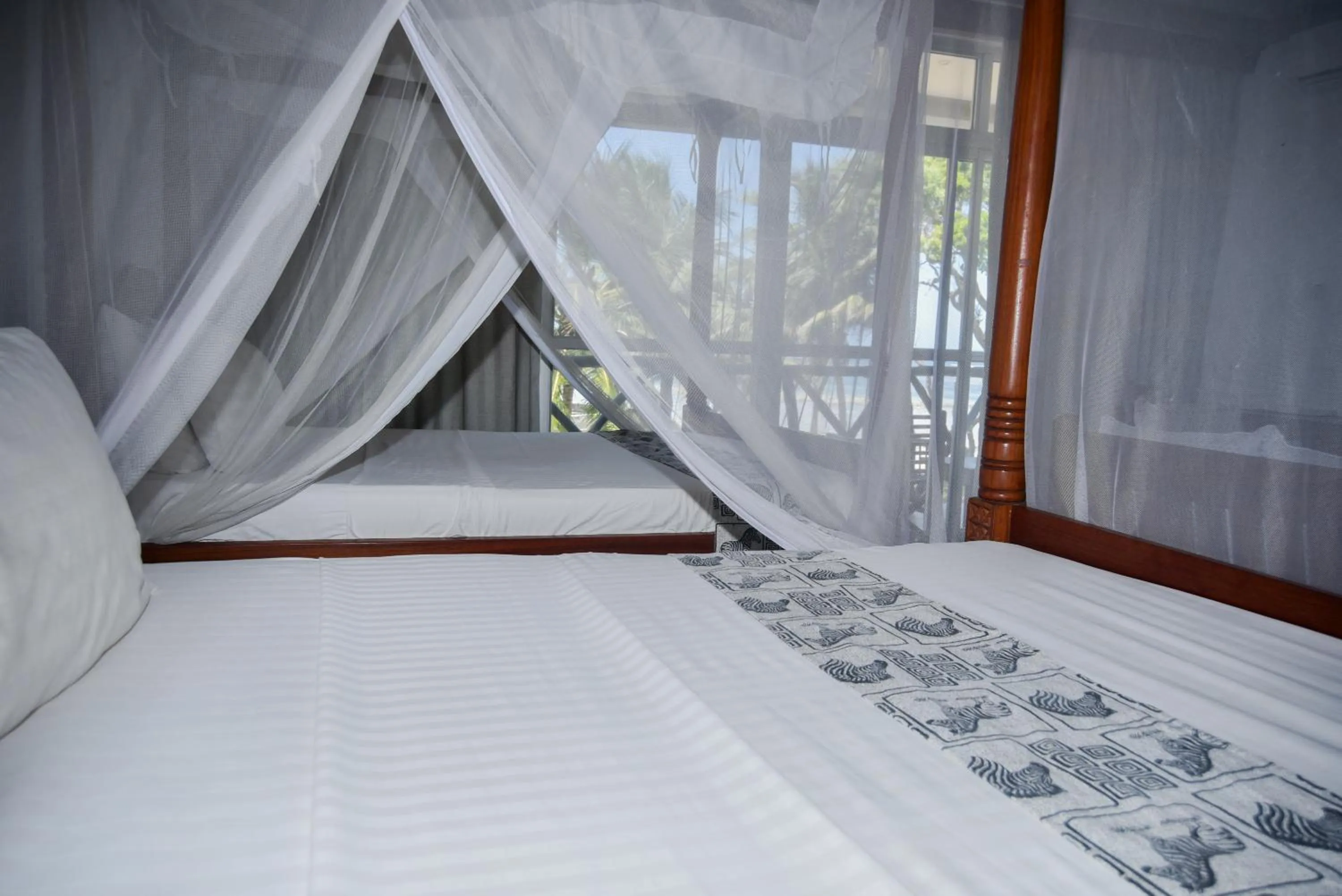 Bed in Coral Beach Resort