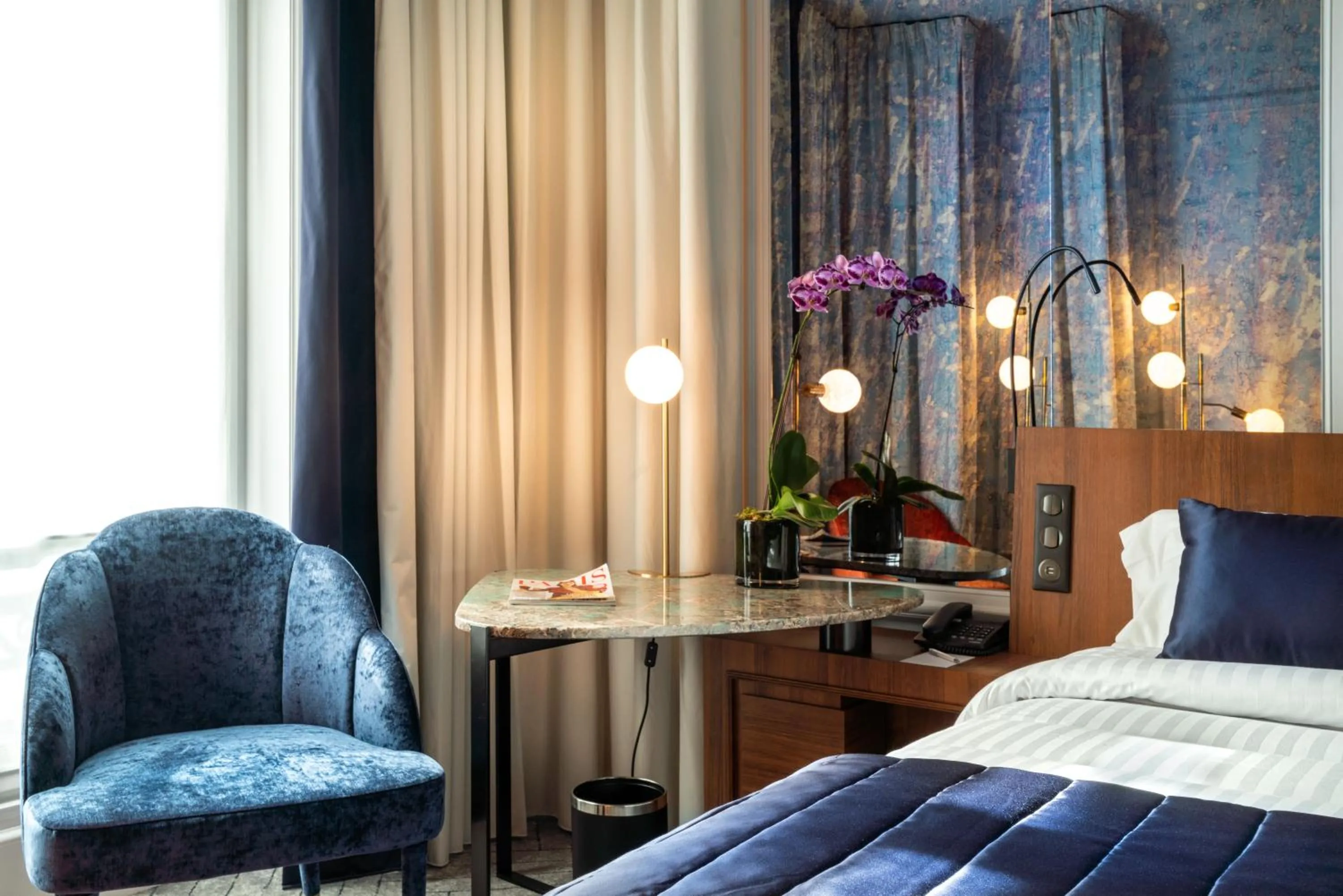 Seating area, Bed in M Social Hotel Paris Opera