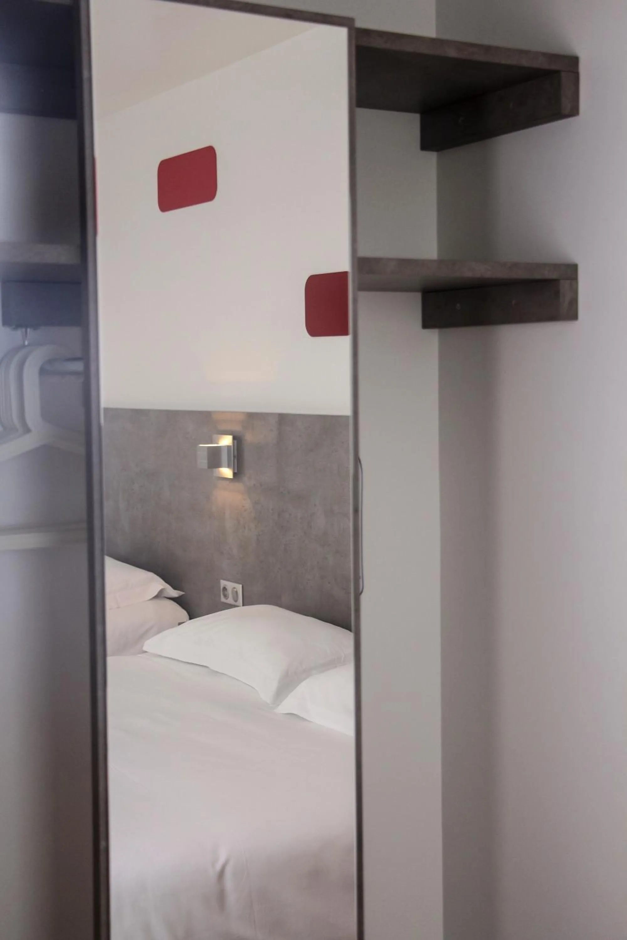 Bed in H24 HOTEL